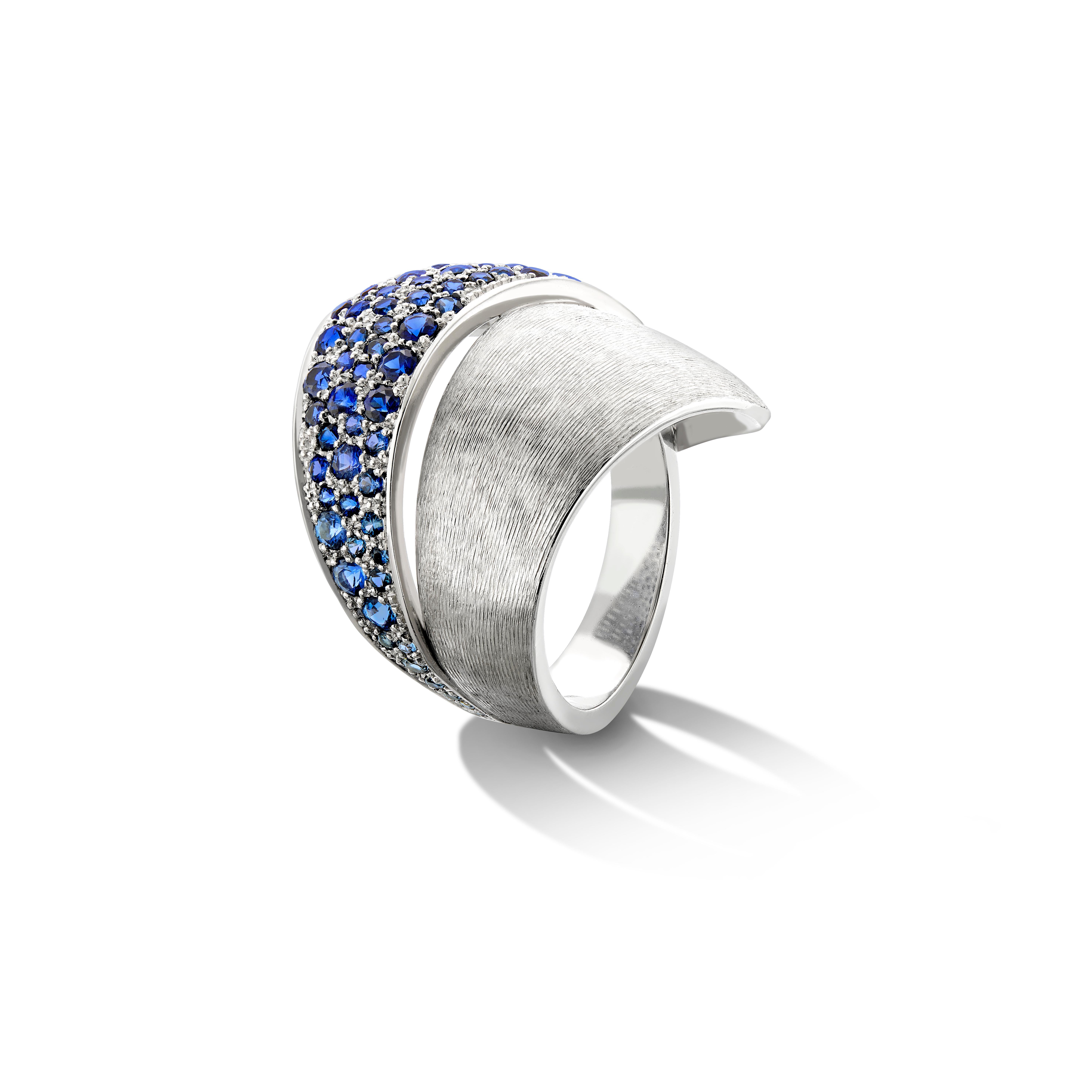 Liv Luttrell 
Curved Forms Ring 2020


Details 
Platinum 
Natural white diamonds, Colour F+, Clarity VS
Graduated colour sapphires 
High polished finish
Made in London 


Customisation 

As this design can be handmade to your order, Liv is able to