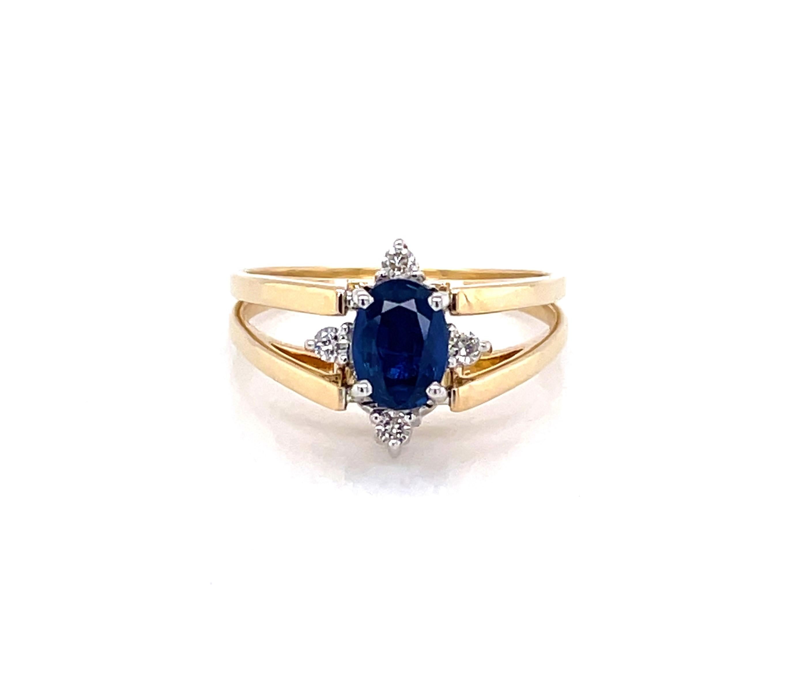 Vivid blue sapphire or a sparkling white cluster of diamonds, it's your choice. This fabulous flip ring presents both looks on demand. Offering a .75 carat (6.5 x 4mm) oval faceted sapphire accented with four round diamonds and on the reverse flip,