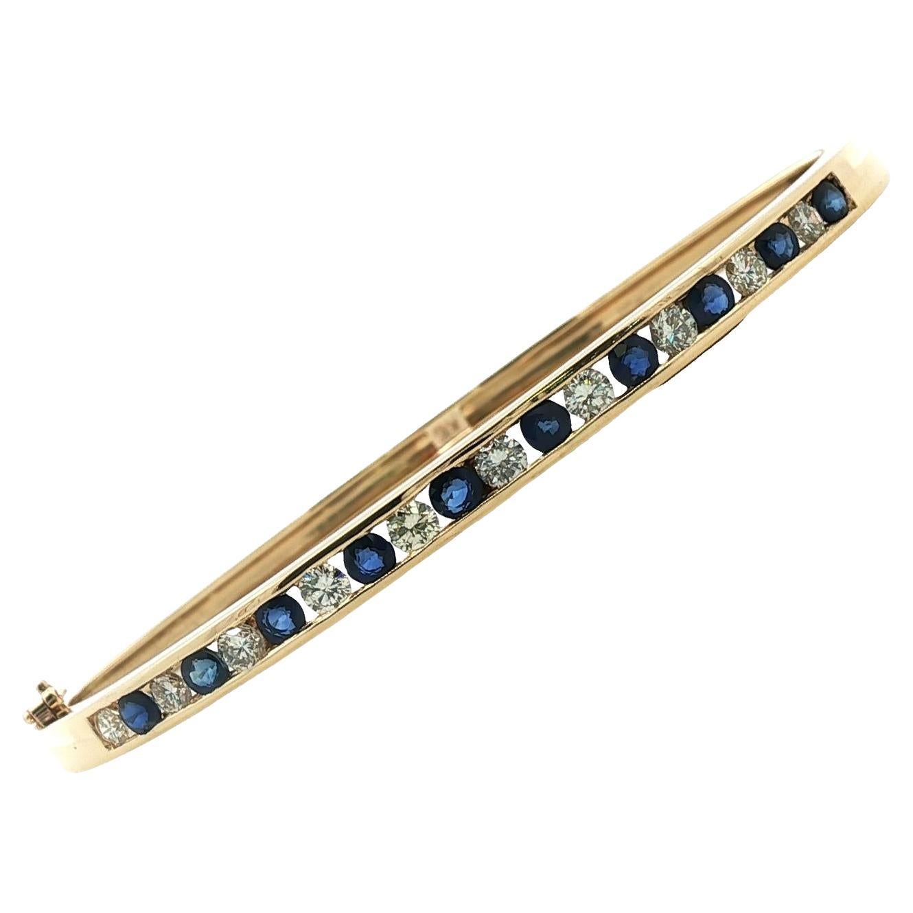 Sapphire Diamond 18 Karat Yellow Gold Hinged Oval Bangle Bracelet
