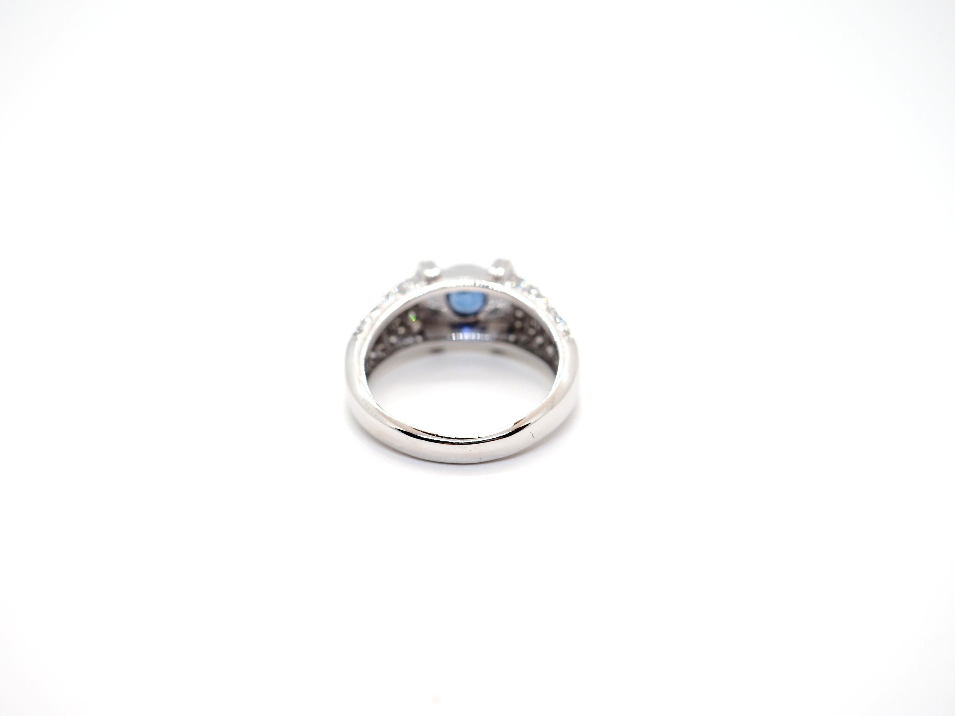 Modern Sapphire Diamond 18 Karat White Gold Ring For Sale