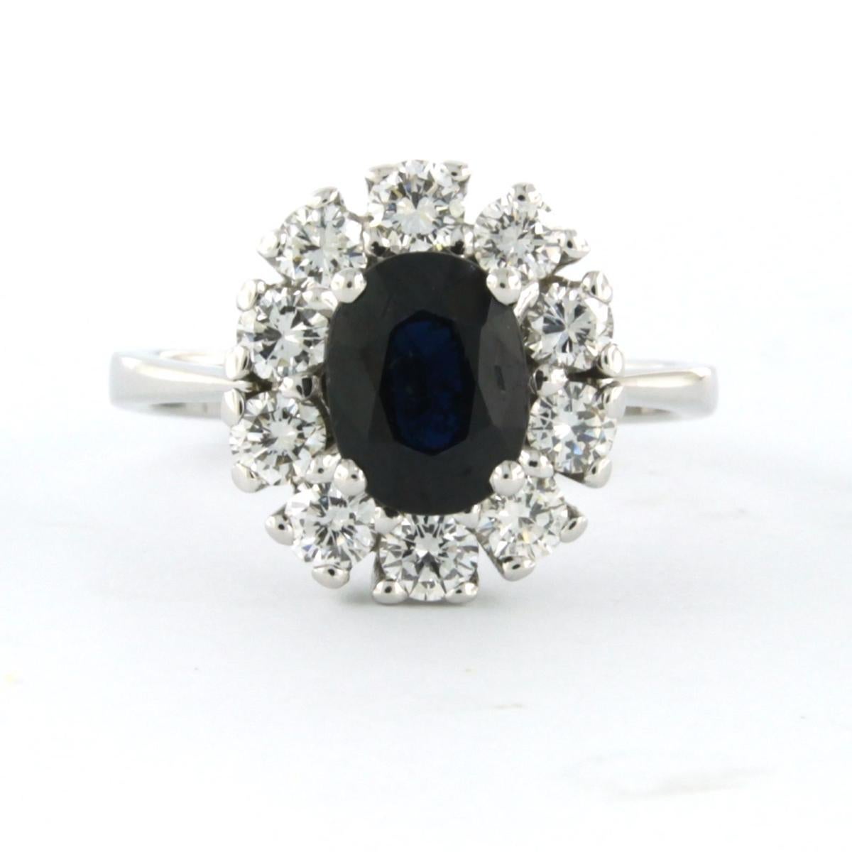 Beautiful modern ring in 18 kt white gold, with sapphire surrounded by ten brilliant cut diamonds.

Total diamond 0.90 carat, colour F/G clarity VS

One sapphire approx. 1.05 carat, dark blue colour

Weight of the ring is  5.1 gr

Height 1.4 cm