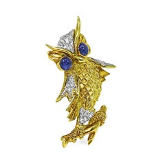 Épingle au hibou en or jaune et blanc 18k avec saphir et diamant