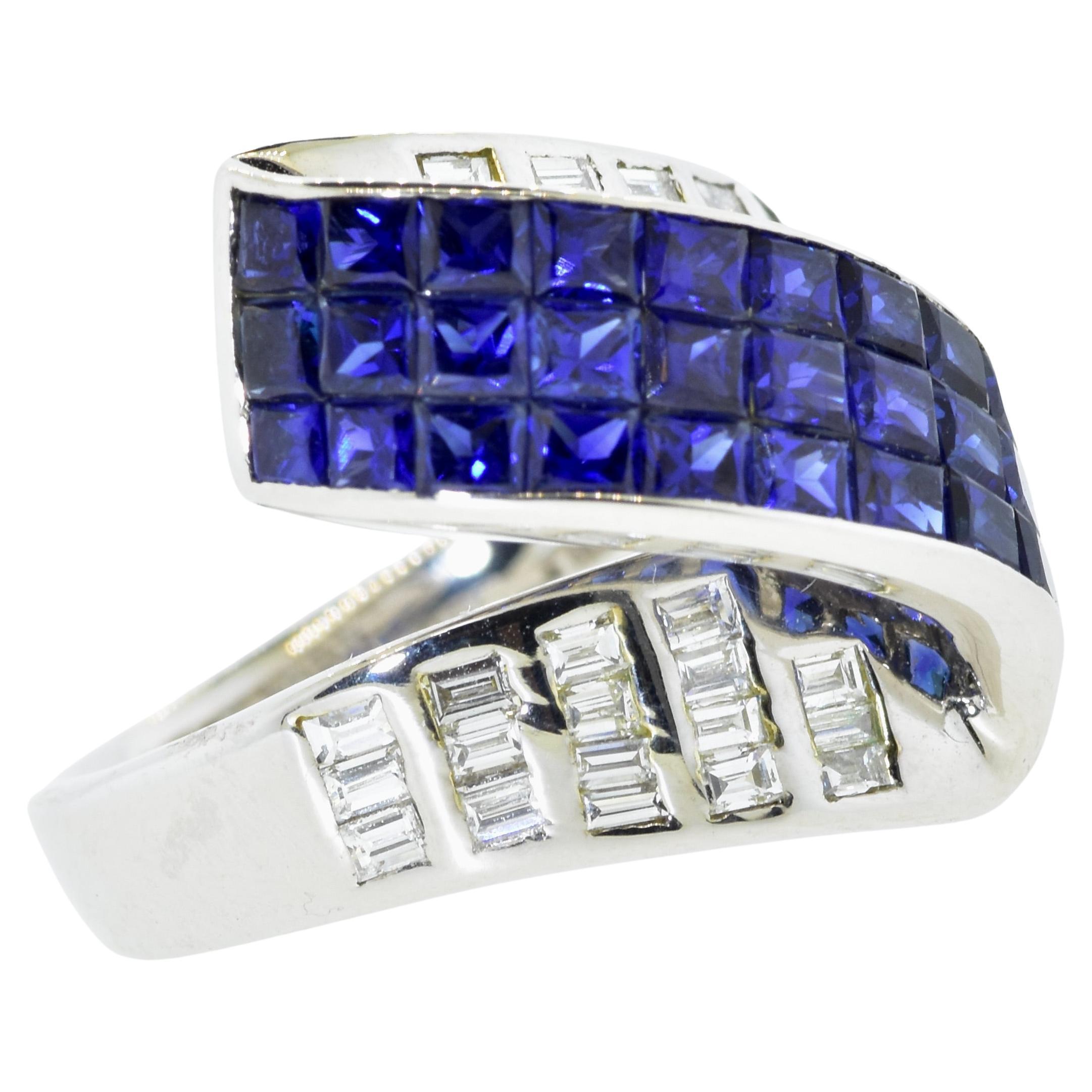 Diamond and Sapphire Contemporary ring.  In a scroll like motif, this unusual and finely made ring possesses invisibly set (one cannot set the metal between the sapphires)  natural vivid royal blue sapphires   The weight of these sapphires is