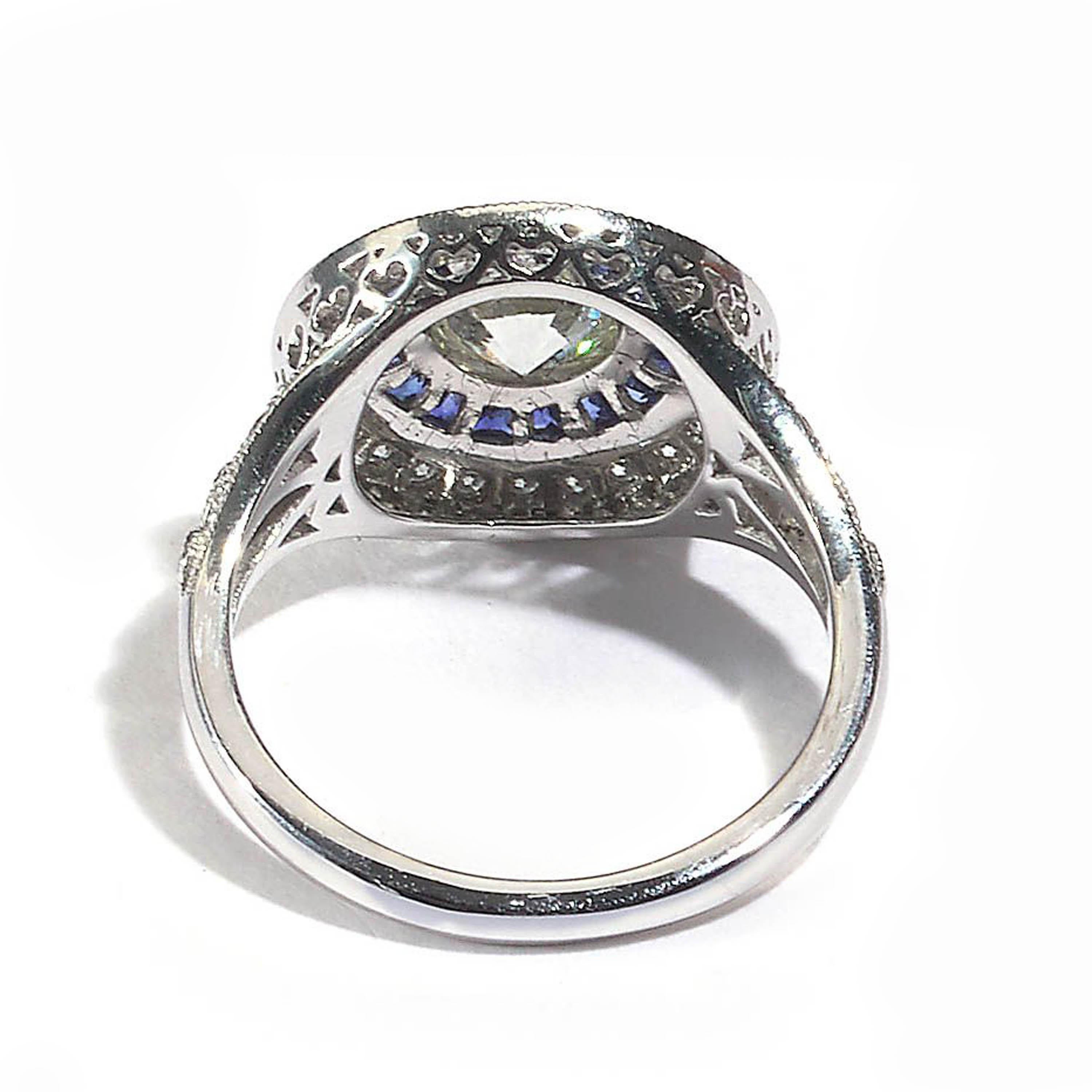 Sapphire, Diamond and Platinum Cluster Ring, 0.90 Carat In Excellent Condition In London, GB