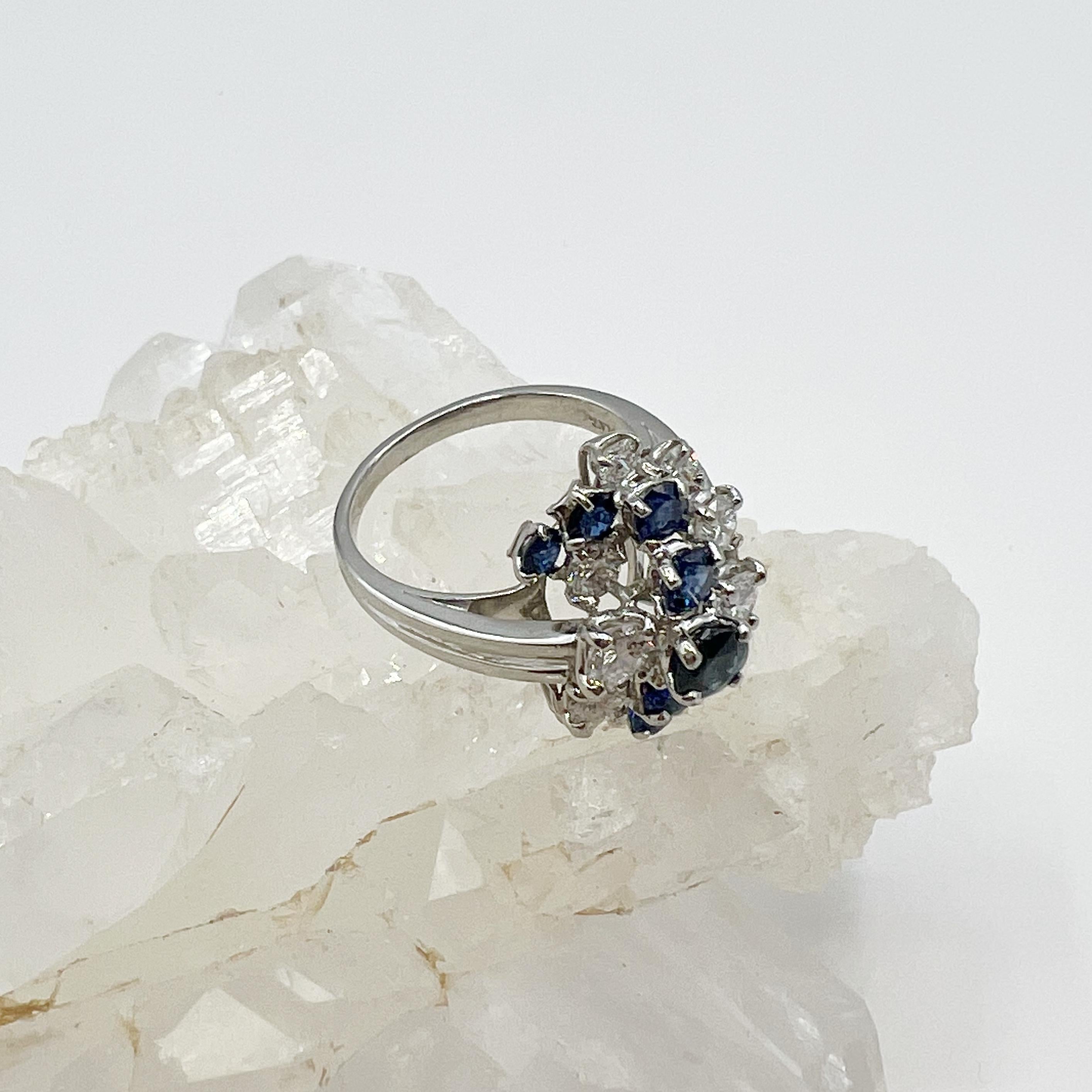 Round Cut Sapphire, Diamond and Platinum Cluster Ring
