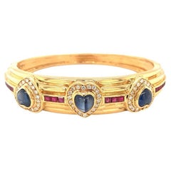 Sapphire, Diamond and Ruby Bangle in 18k Yellow Gold, circa 1970s