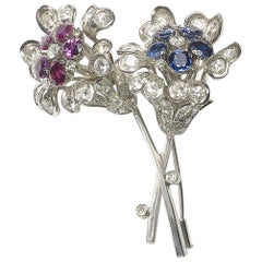 sapphire and ruby flower spray brooch Sapphire Diamond and Ruby Flower White Gold 18 Carat Brooch