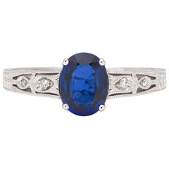 Bague en or blanc, saphir et diamant