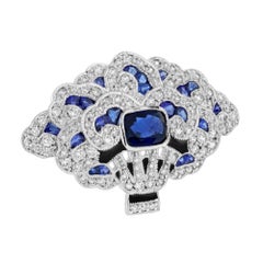 Spilla a ventaglio in stile Art Deco con diamante e zaffiro e smalto nero in oro bianco 14 carati