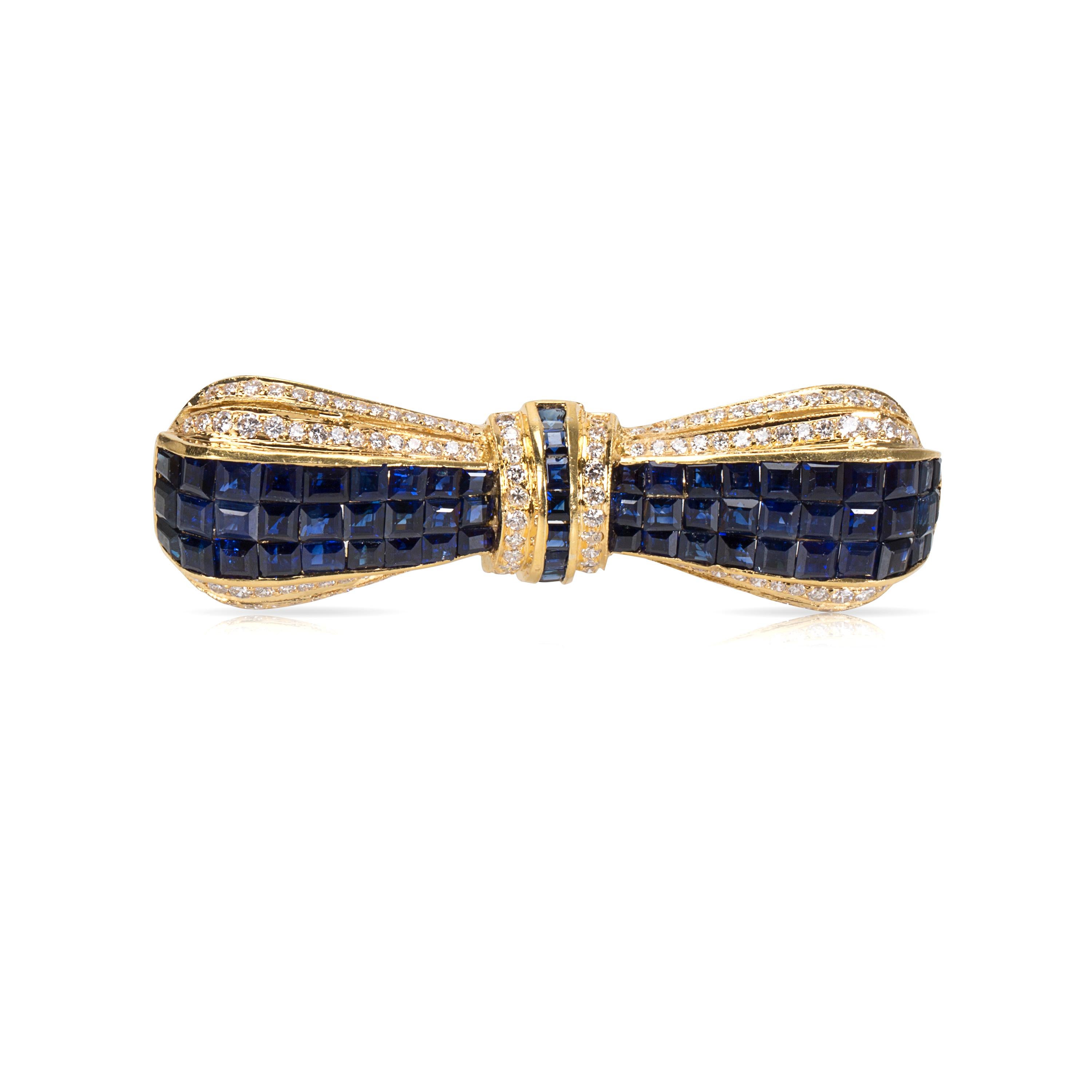 Total diamond weight: 1.20 cts
Total sapphire weight: 8.00 cts

This brooch is 2 inches in length.
