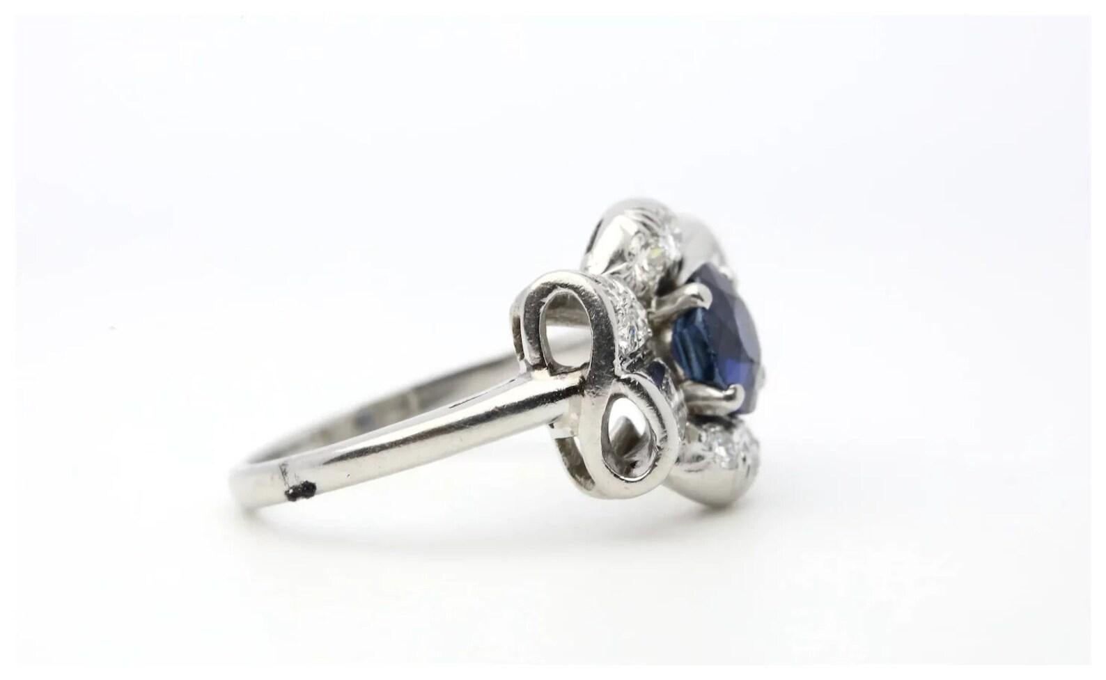 Art Deco Sapphire & Diamond Bow Motif Ring in Platinum by Maurice Tishman