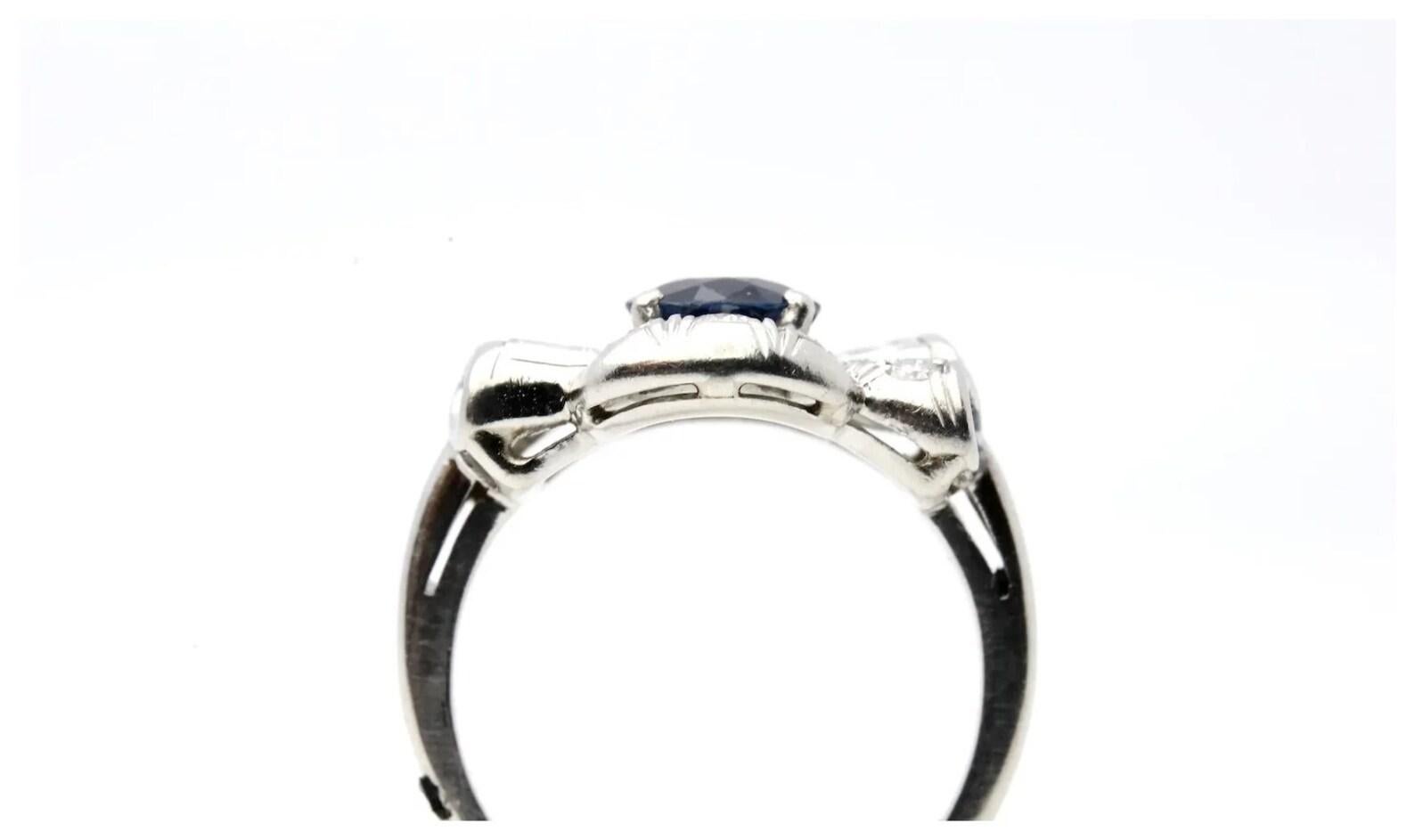 Sapphire & Diamond Bow Motif Ring in Platinum by Maurice Tishman In Good Condition In Boston, MA