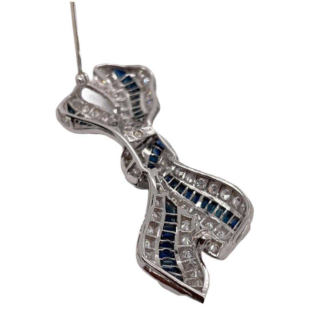 Art Deco Sapphire & Diamond Bow Ribbon Brooch in 18K White Gold For Sale