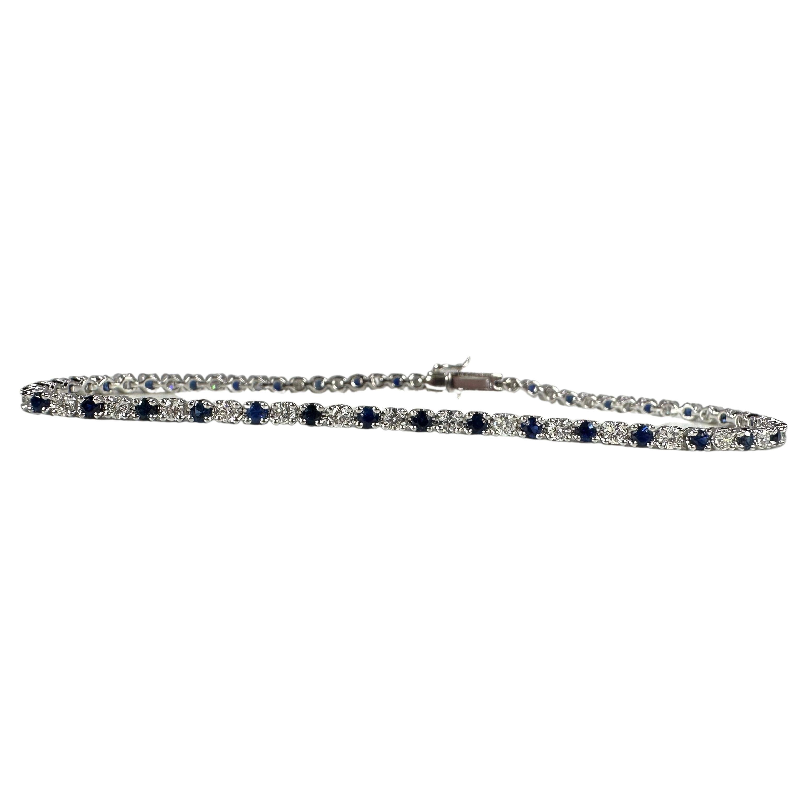 Bracelet tennis en or blanc 14 carats avec saphirs et diamants en vente