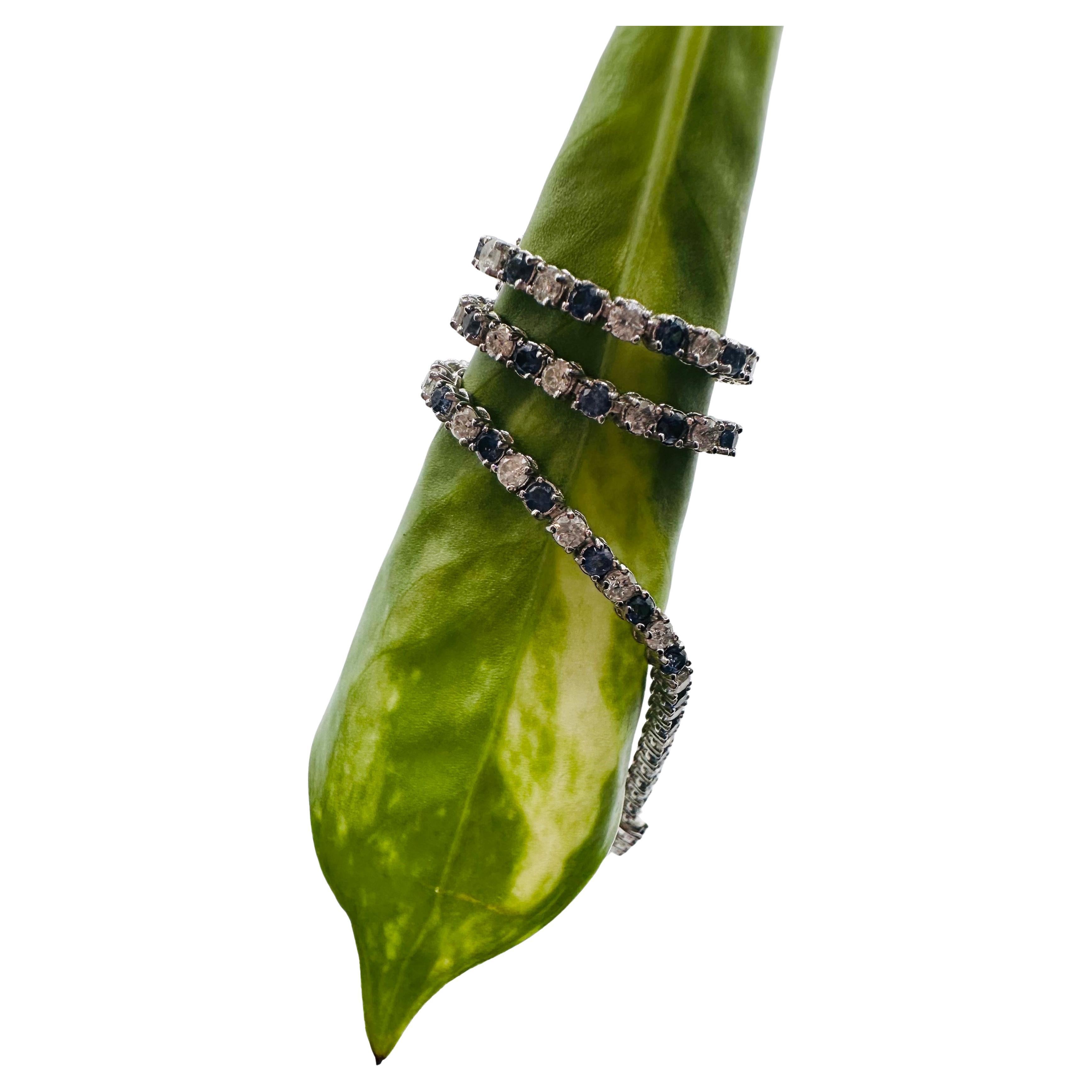 Superbe bracelet de tennis avec saphirs naturels et diamants en or 14KT, fermoir sécurisé, bracelet en or massif et 3 carats de pierres précieuses ! Les diamants pèsent 1,45 carats et sont de pureté SI et de couleur G. Les saphirs sont bleus avec