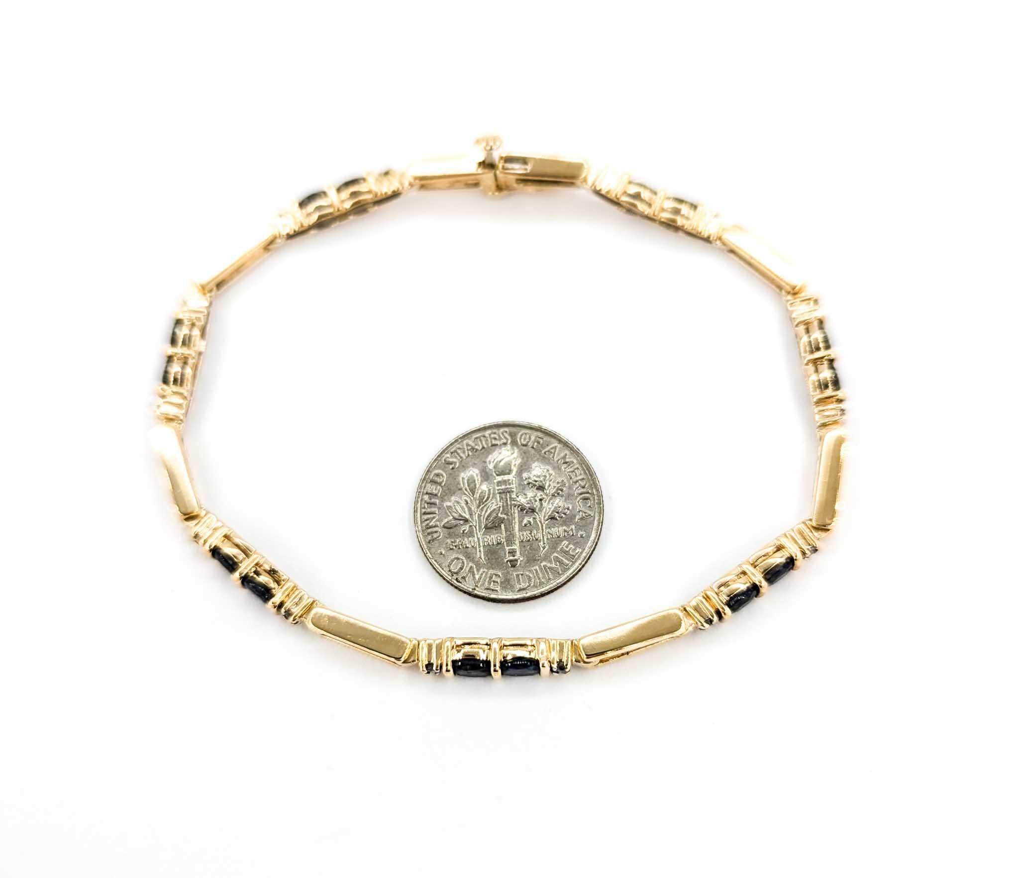 Dainty Sapphire & Diamond Bracelet in 14k Yellow Gold

This beautiful bracelet is crafted in 14k yellow gold and features 2.80ctw of sapphires, the birthstone for September. Sapphires are known for their vibrant blue hue, symbolizing wisdom,