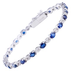 Sapphire Diamond Bracelet in 18 Karat Gold Weighing 10.53 Grams in 0.60 Carat