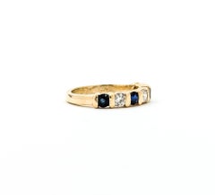 Anello nuziale con zaffiro e diamante in oro giallo 14k