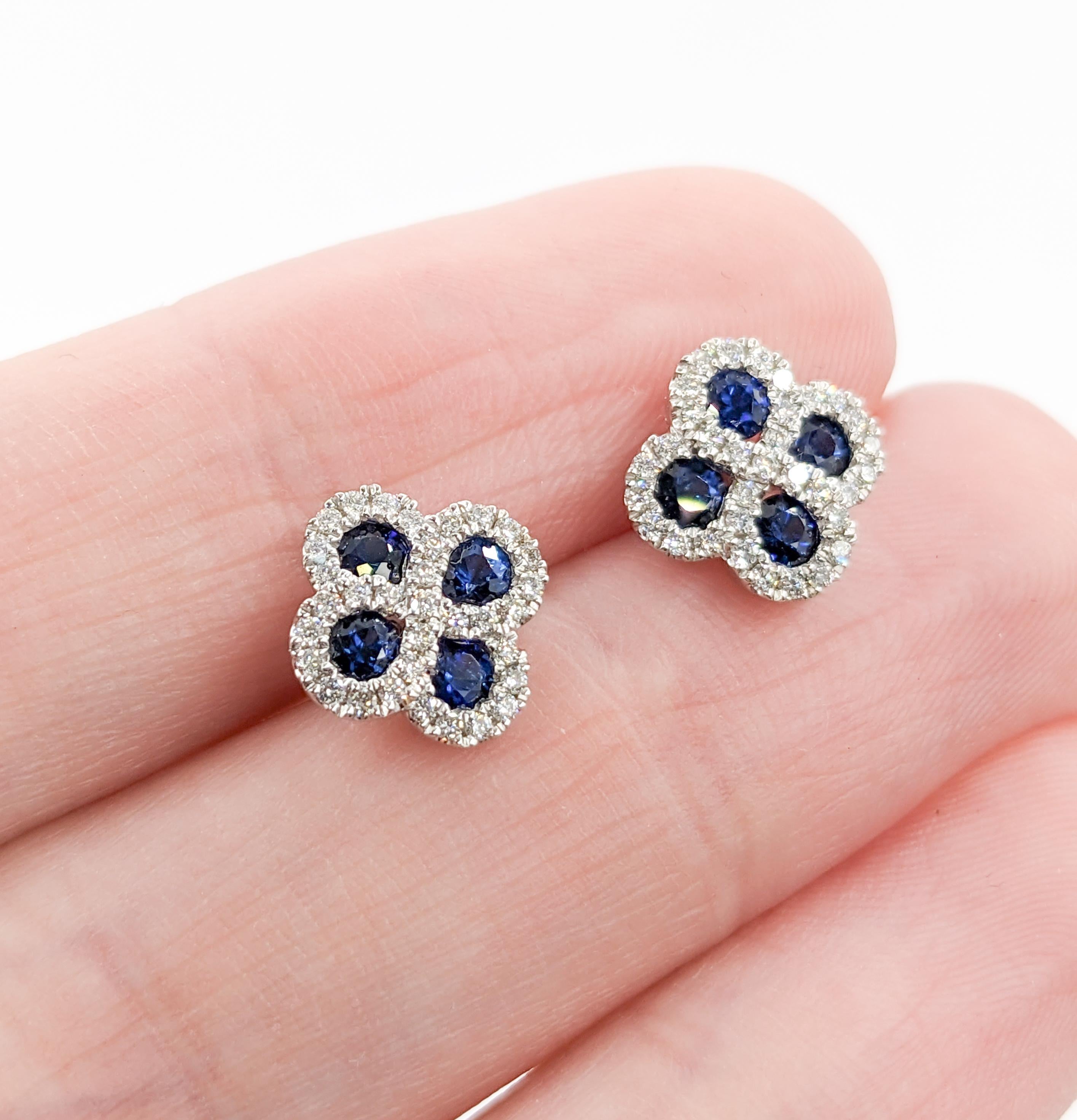 Sapphire & Diamond Clover Shaped Stud Earrings in White Gold

These exquisite quatrefoil shaped sapphire earrings are meticulously crafted in 14k white gold with 0.40 carats of deep blue sapphires.
In addition to the sapphires, these earrings are