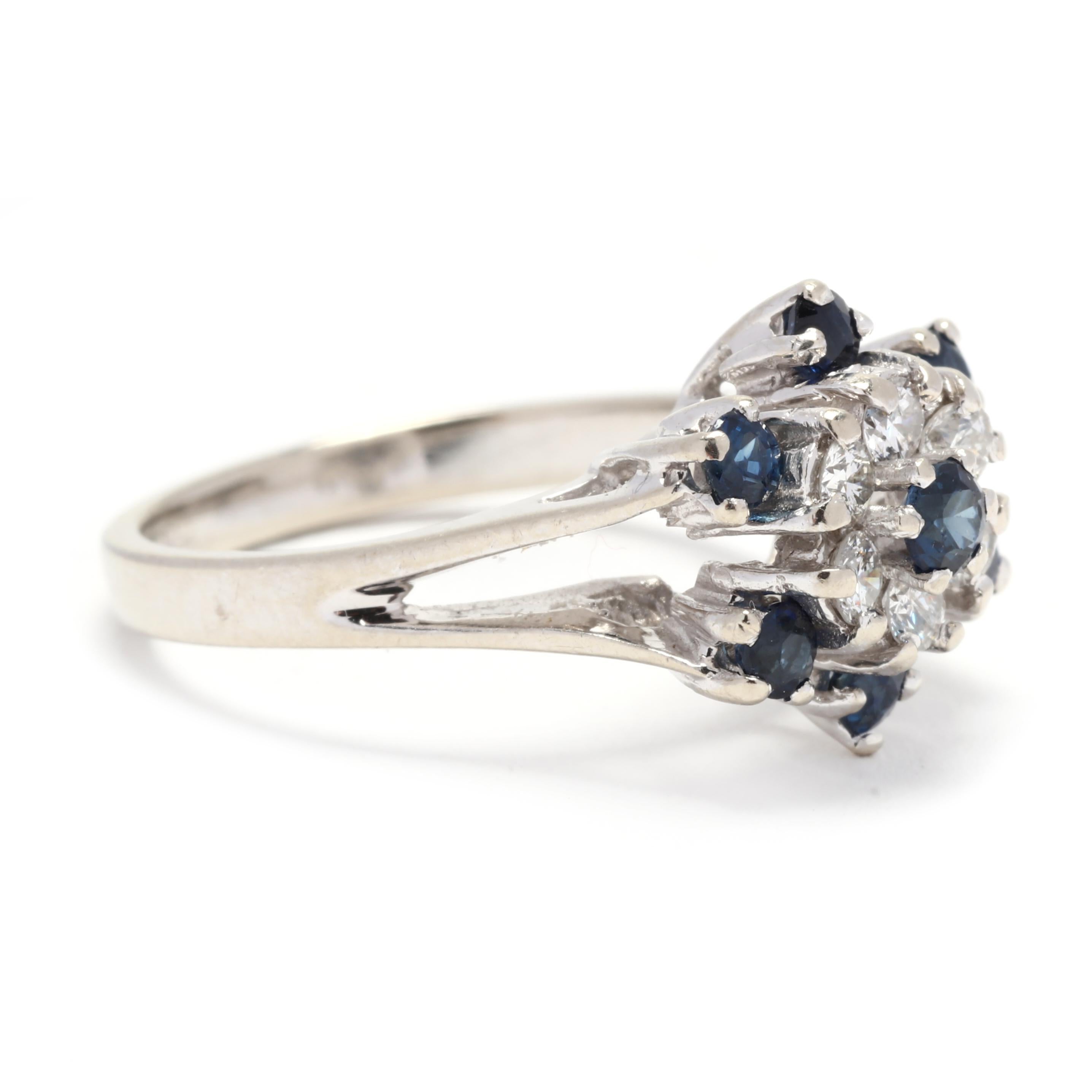 This dazzling Sapphire Diamond Cluster Cocktail Ring is a show-stopping piece of jewelry. Made with 14K white gold, this ring features a vibrant blue sapphire center stone weighing approximately 0.75 carats. Surrounding the sapphire are sparkling