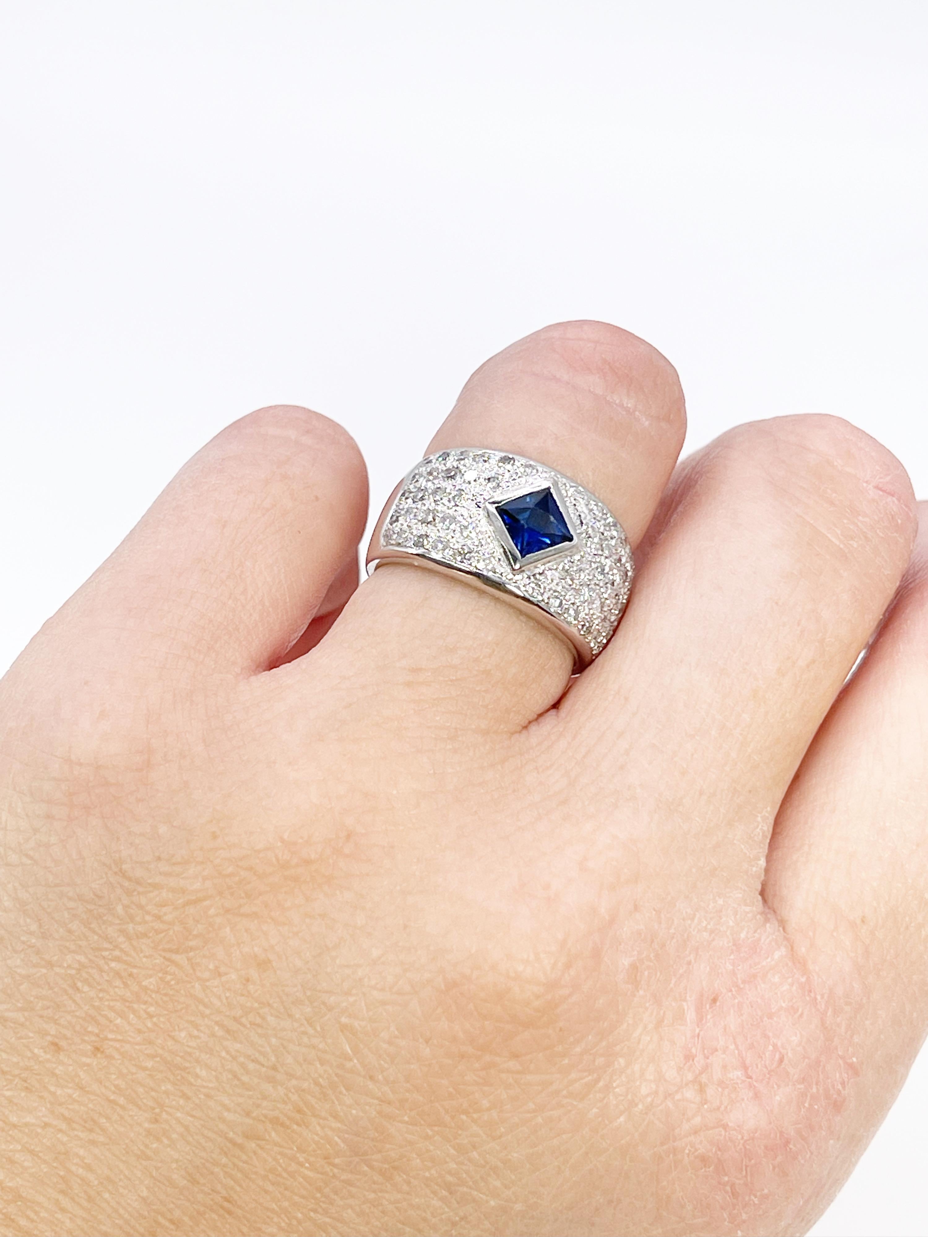 Stunning cocktail ring in 18KT white gold, made with natural diamonds and sapphire.

GRAM WEIGHT: 8.38gr
GOLD: 18KT white gold
NATURAL SAPPHIRE
Cut: Square
Color: Blue
Clarity: Slightly Included
Carat:1.20ct

NATURAL DIAMOND(S)
Cut: Round
