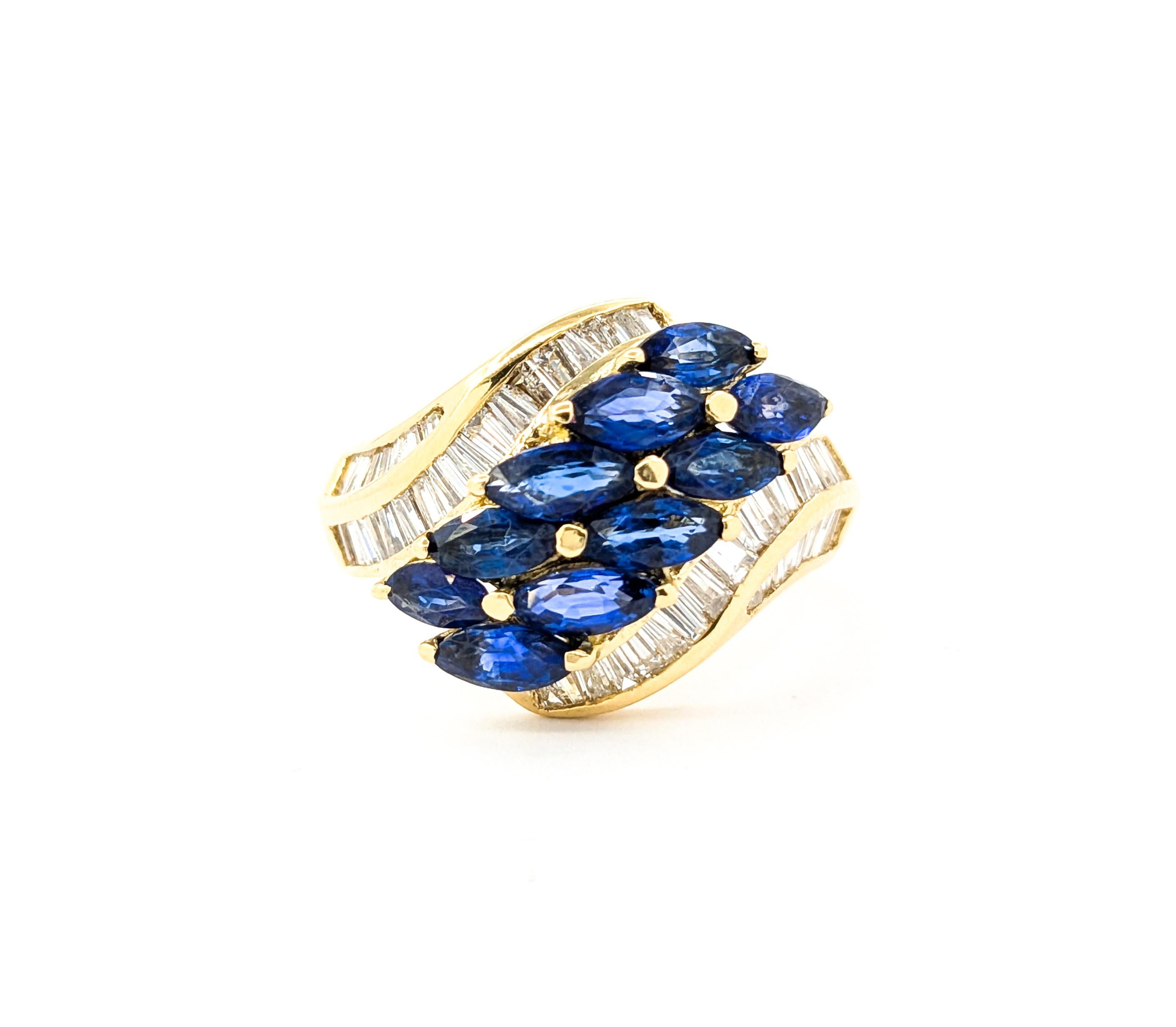Sapphire & Diamond Cocktail Ring In 18kt Yellow Gold

Introducing this beautiful gemstone ring crafted in 18kt yellow gold. The ring features a 2ctw sapphire centerpiece and 1.02ctw baguette diamonds in a channel set. The sparkly 1.02ctw diamonds