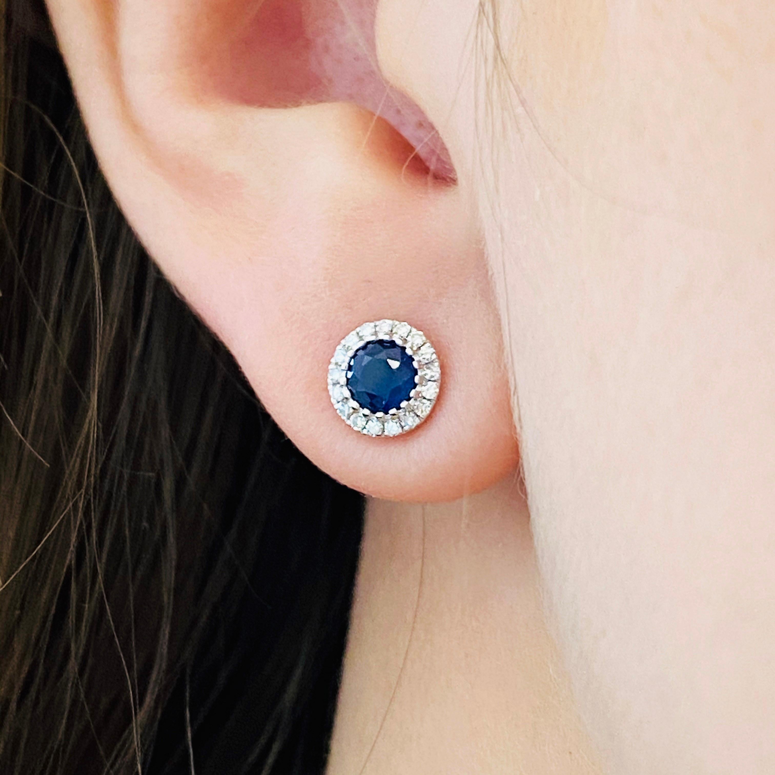 INCREDIBLE SAPPHIRE AND DIAMOND EARRINGS w diamond halo around:
14kt White Gold
.70 CT Blue Sapphire Total Weight
.11 CT White Diamond Total Weight (SI1 clarity and G color)
Earring Diameter: 6.43mm/.25in
Sapphire Diameter: 4.91mm/.19in
Weight Per