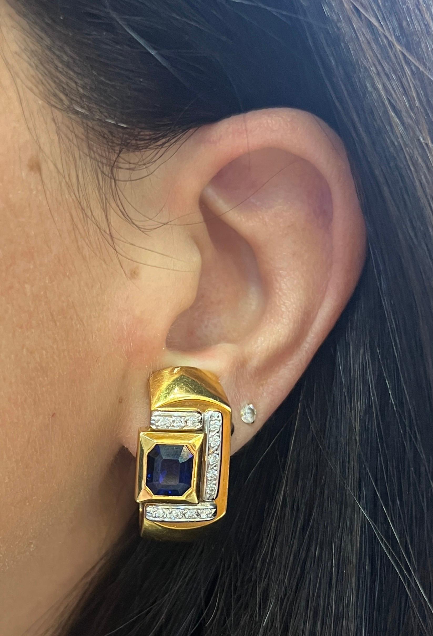 Sapphire & Diamond Earrings

A pair of earrings featuring emerald cut sapphires & surrounded by round cut diamonds set in 18 karat yellow gold.

Back Type: clip on 

Diamond Weight: approximately .48 carats 

Measurements: 1.10