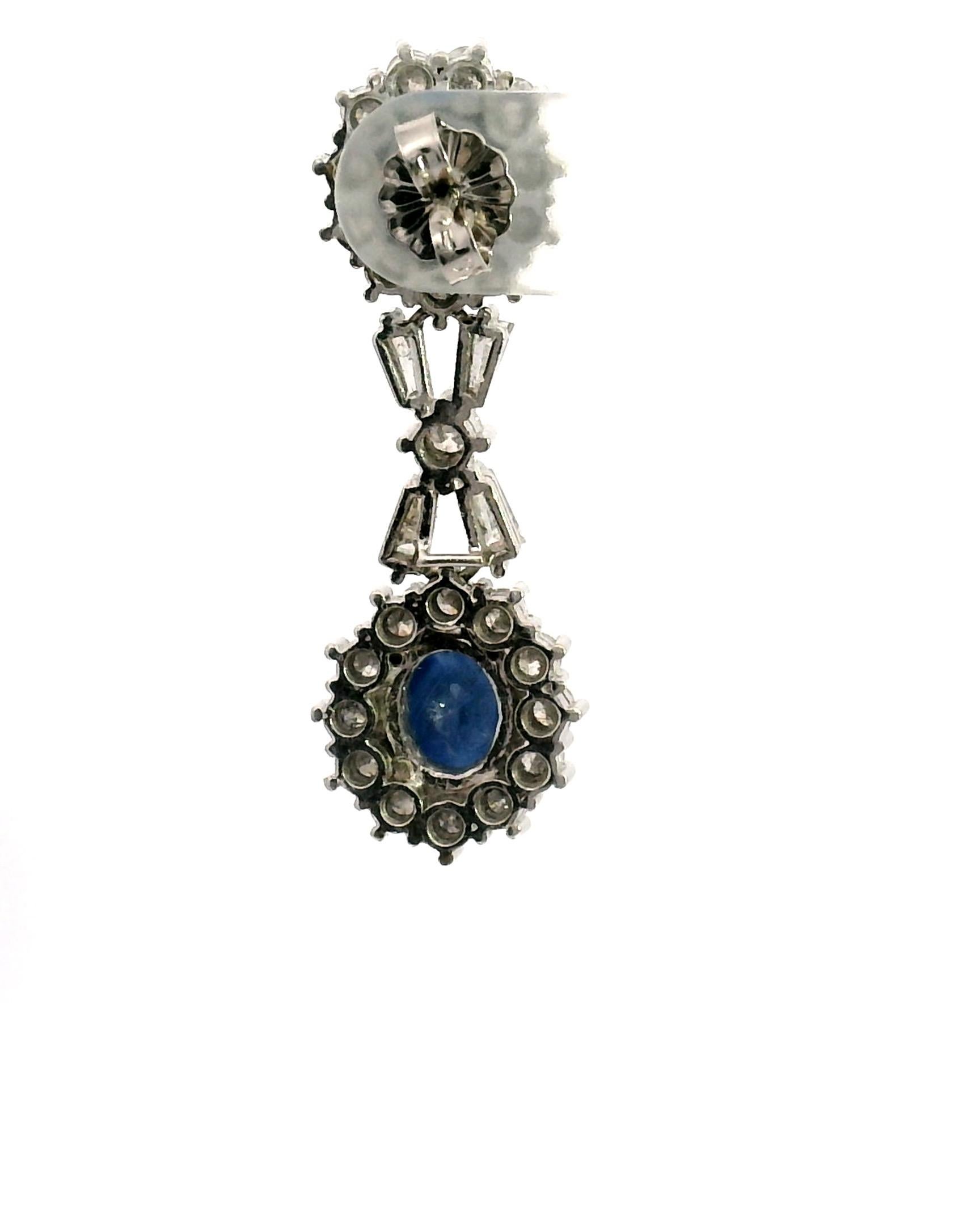Donna Orecchini con diamante e zaffiro in vendita