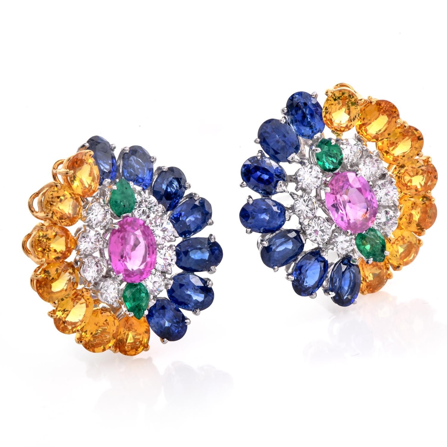 These stunning GIA floral cluster design cocktail earrings are masterfully crafted with a vibrant arrangement of pink, yellow, and blue sapphires.

These Cllip-on Sapphire earrings are decorated with pear-shaped emeralds and round diamonds, creating