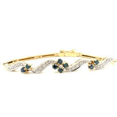 Sapphire & Diamond Flower Design Line Bracelet in 14K Gold