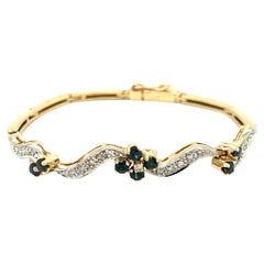 Sapphire & Diamond Flower Design Line Bracelet in 14K Gold 