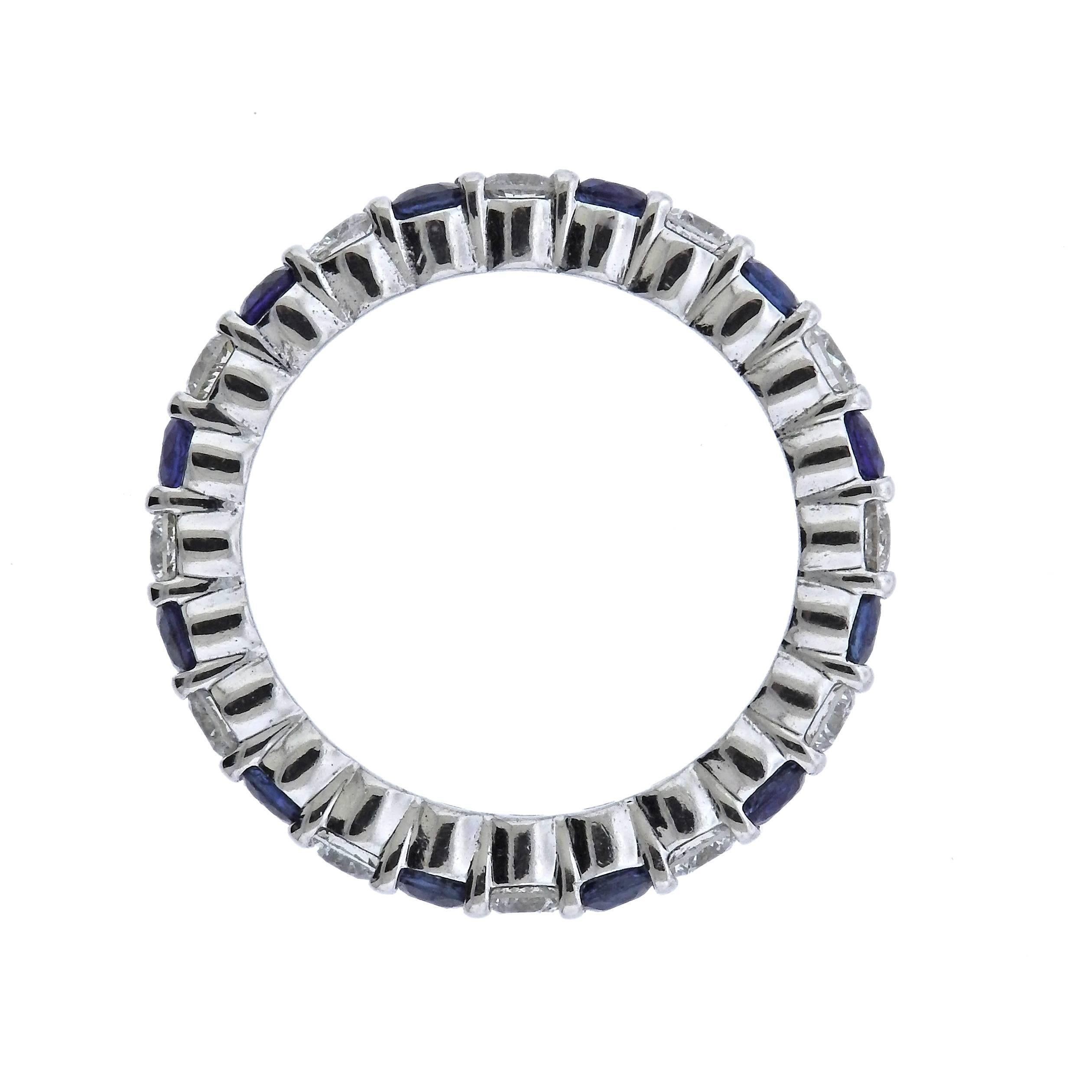 Classic 14k white gold wedding eternity band ring, set with full circle of alternating blue sapphires and 0.96ctw in SI1/GH diamonds. Ring size - 6, ring is 2.7mm wide , weighs 2.6 grams. 