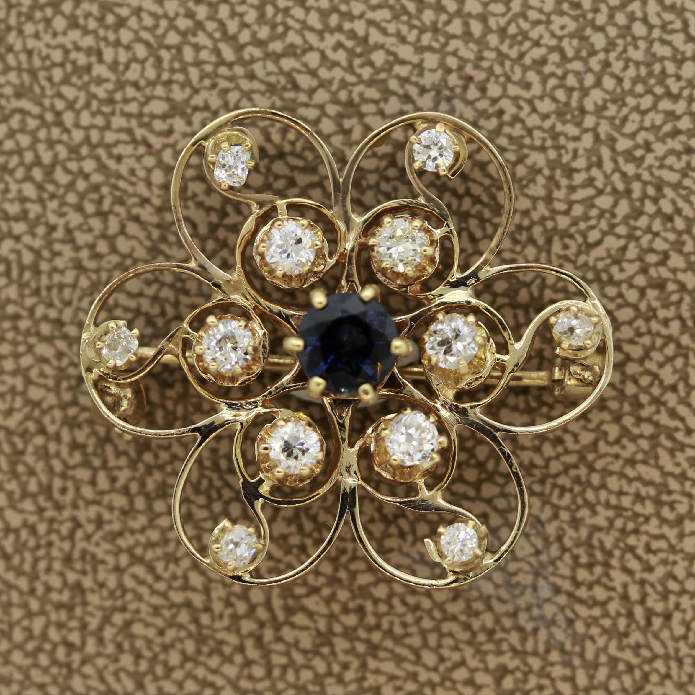 A cute brooch featuring a round cut blue sapphire weighing 0.90 carats along with 0.75 carats of round brilliant cut diamonds. Made in 14k yellow gold and light weight, it is easy to wear with all outfits.

Length: 1.1 inches