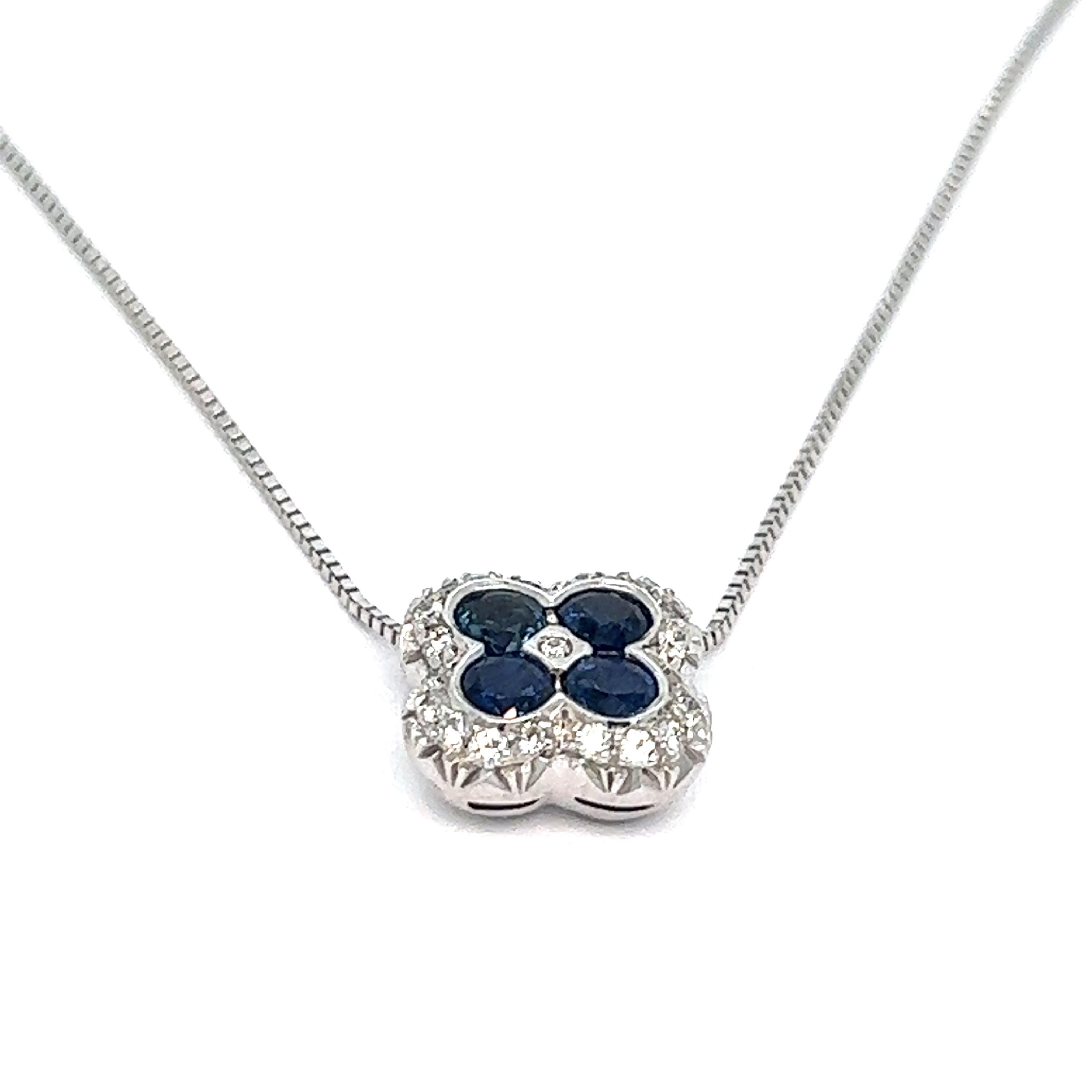 Sapphire diamond gold necklace 

Round-cut sapphires of approximately 0.40 carat, 18 karat white gold; marked 750

Size: width 11 mm, length 11 mm; chain length 16.5 inches
Total weight: 4.3 grams