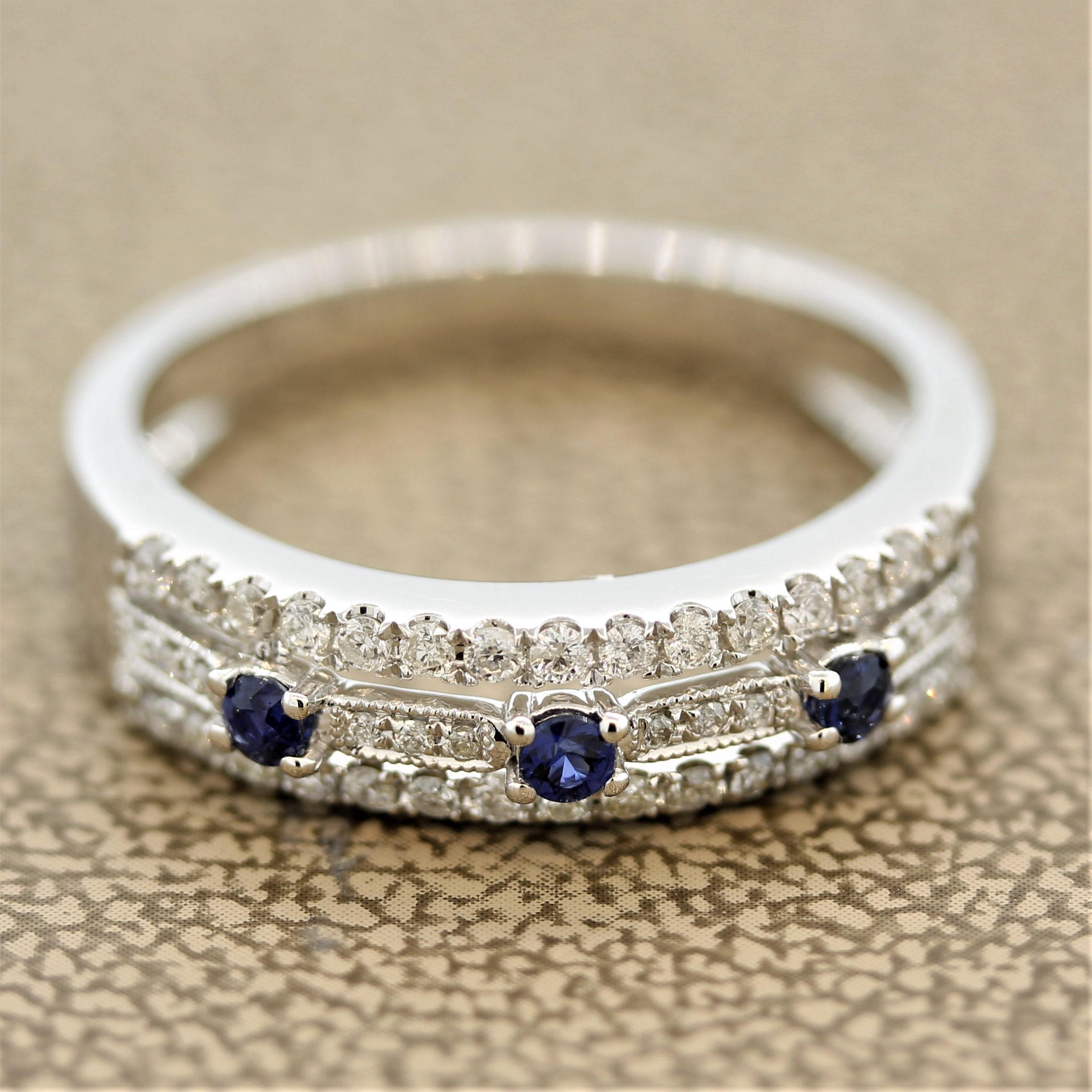 A lovely piece that can be worn every day. It features 3 round cut sapphires weighing 0.15 carats along with 0.30 carats of round brilliant cut diamonds. Made in 14k white gold with open goldwork and millgrain finish on the center.

Ring Size 7