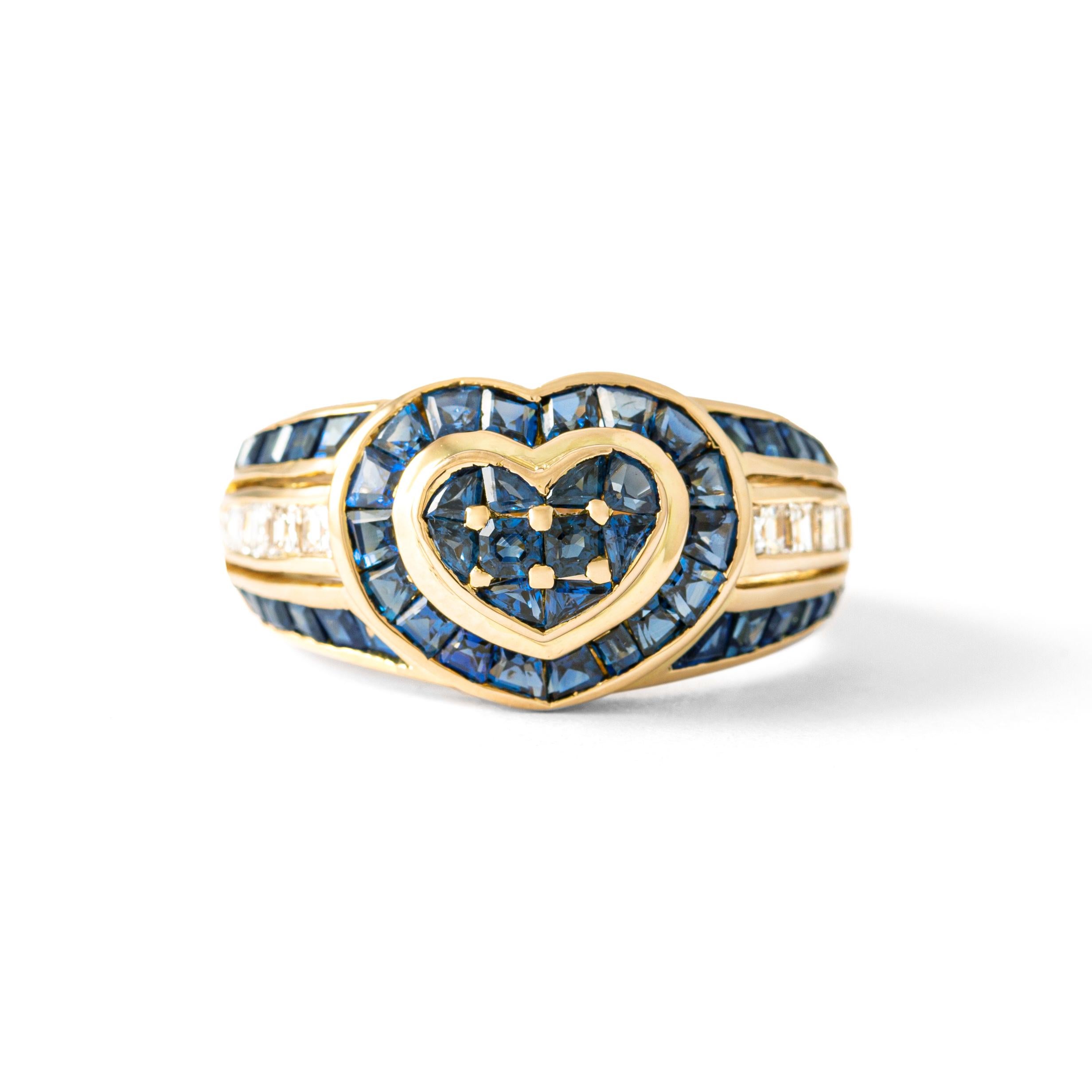Ring in 18kt yellow gold set with blue sapphires and diamonds Size 53 