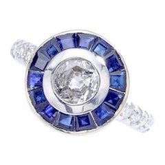Anello in oro con zaffiro e diamante