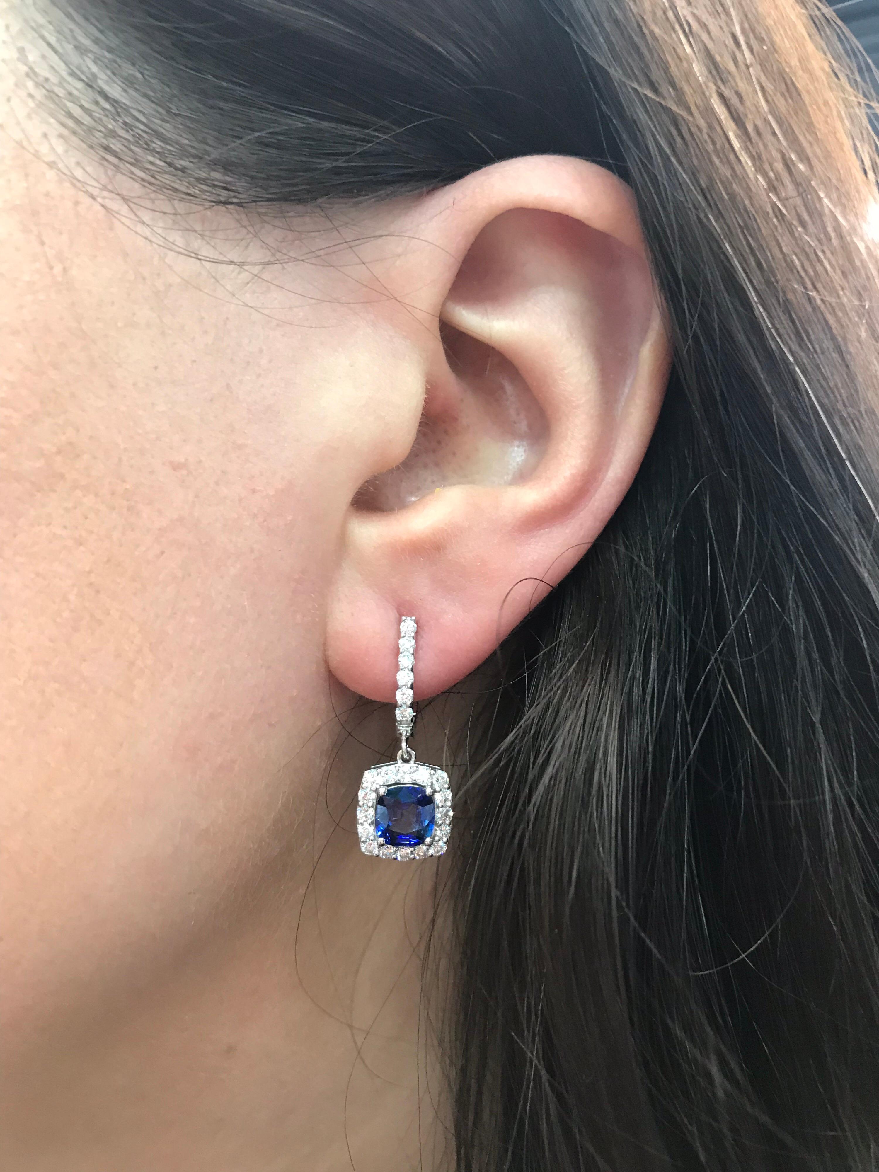 14K White gold featuring two cushion cut blue Sapphires weighing 2.14 carats flanked with round brilliants weighing 0.95 carats.
Color G
Clarity VS-SI