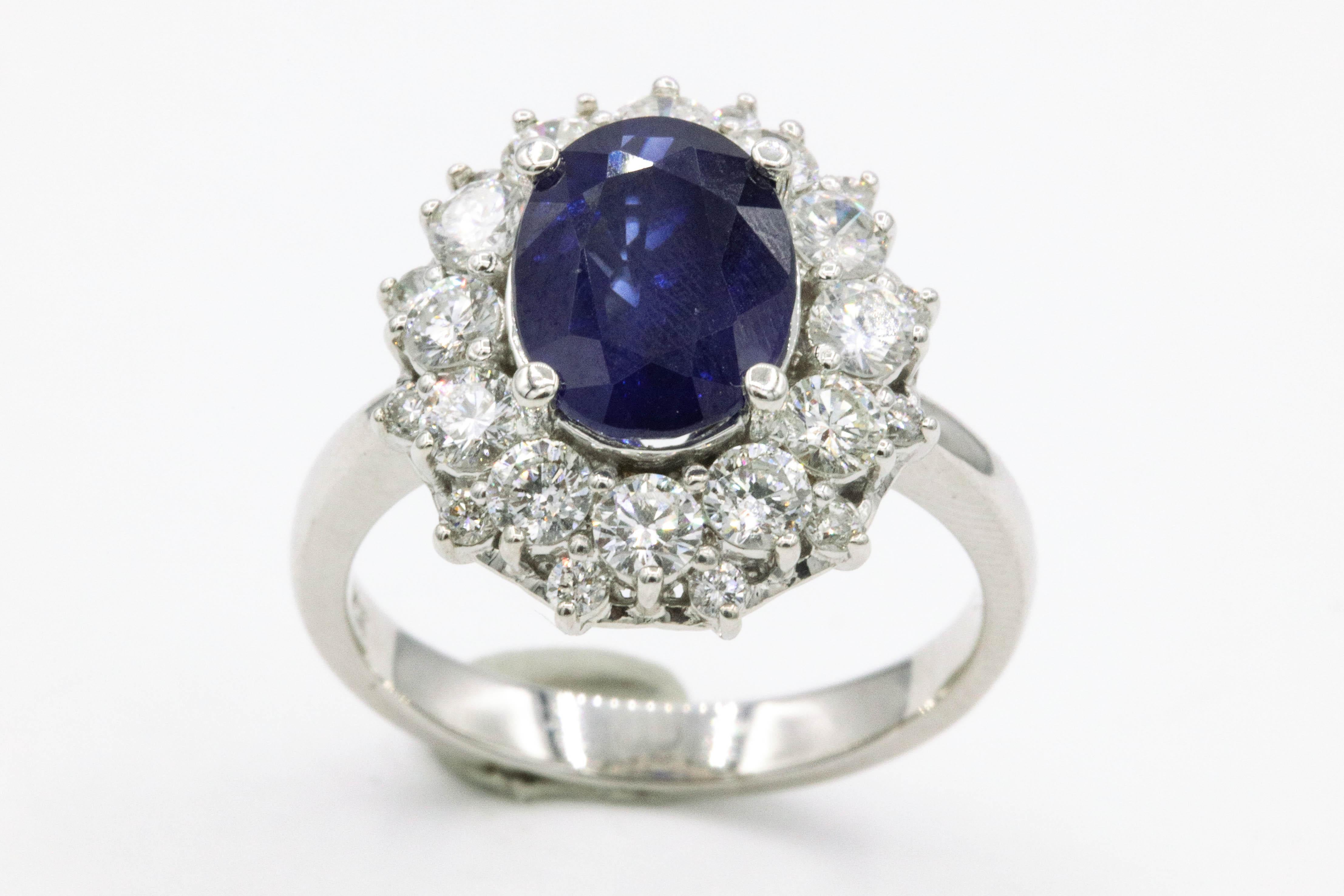 Contemporary Sapphire Diamond Halo Ring 4.59 Carat 18 Karat White Gold