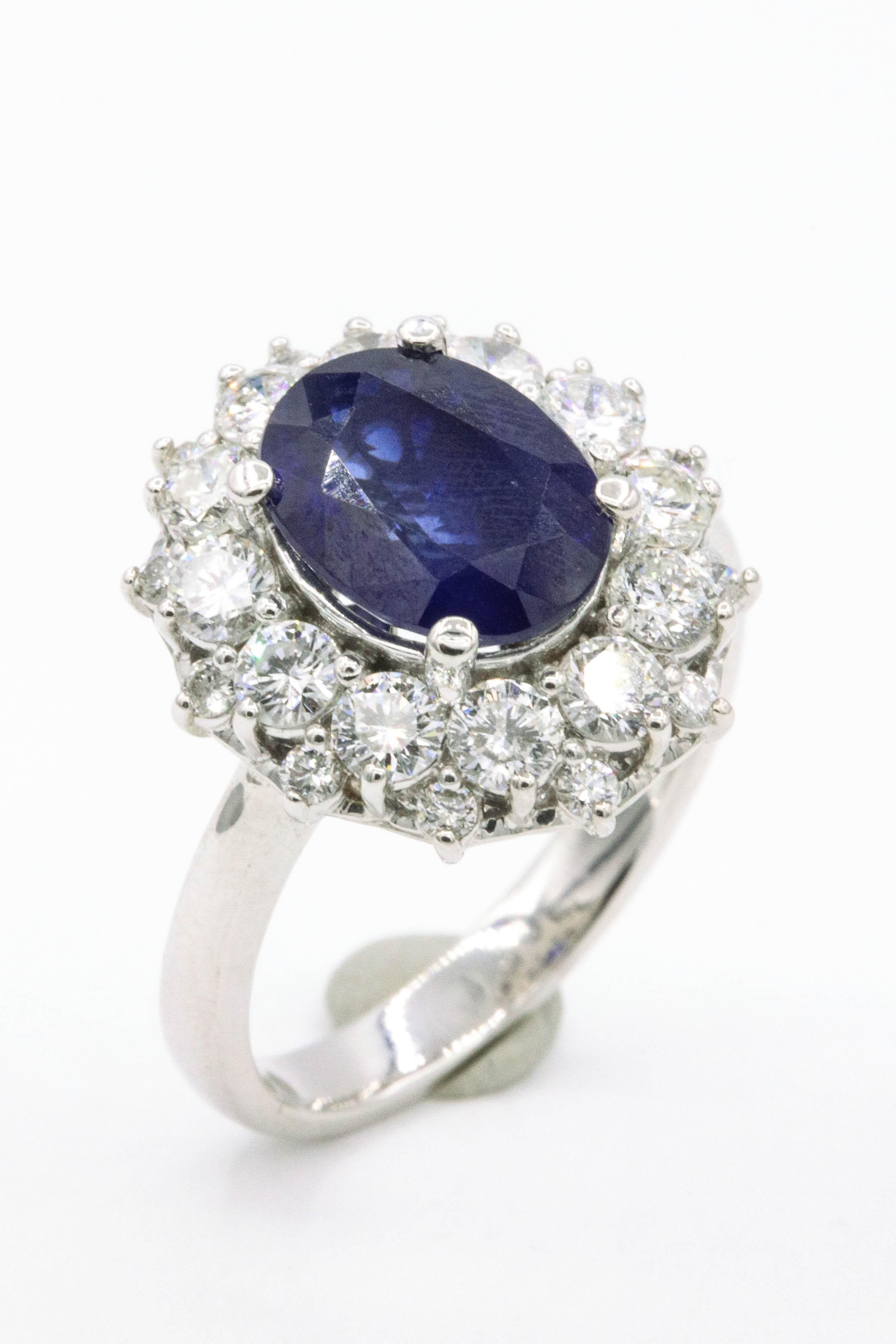 Oval Cut Sapphire Diamond Halo Ring 4.59 Carat 18 Karat White Gold