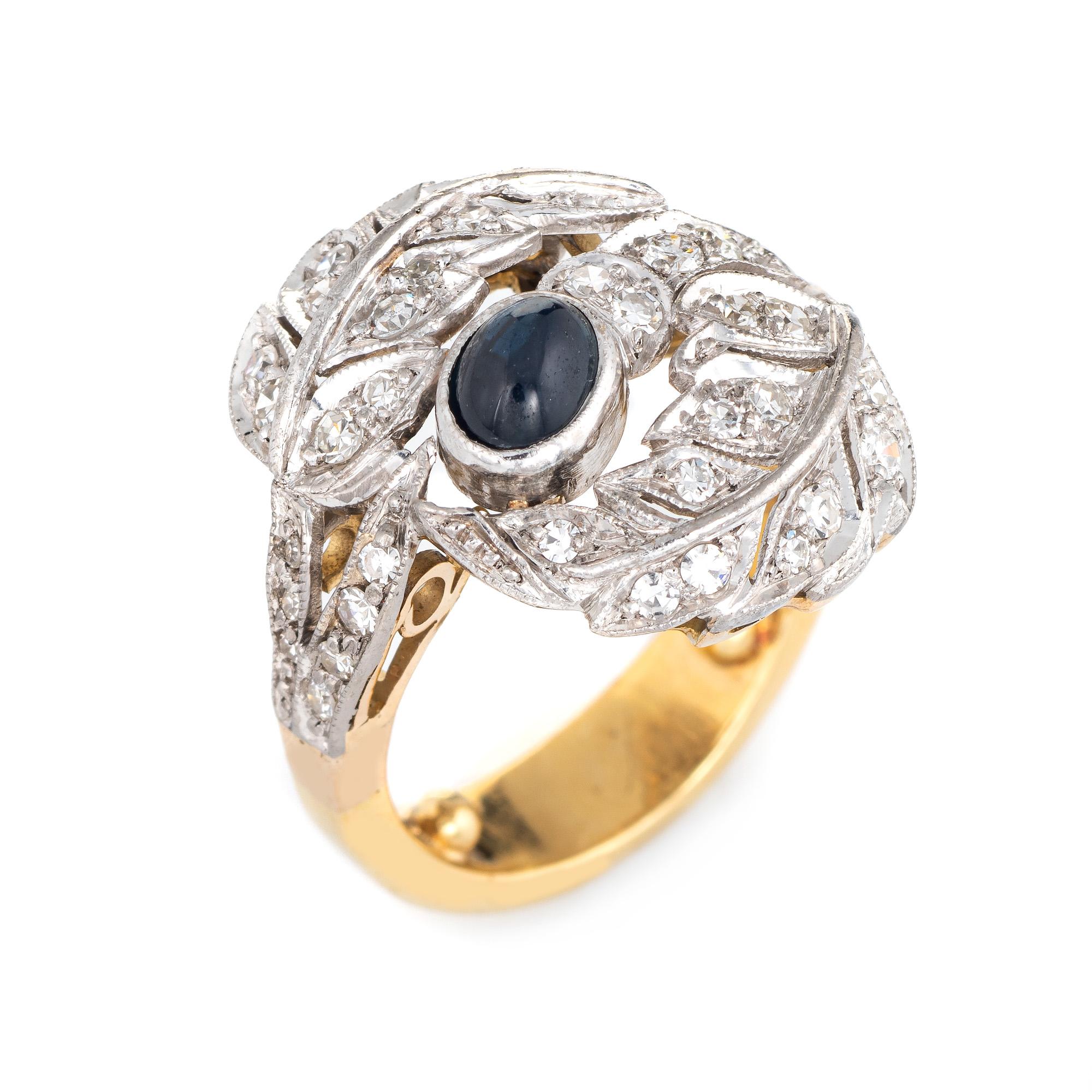 Stylish vintage sapphire & diamond leaf ring (circa 1950s to 1960s) crafted in 18 karat yellow & white gold. 

Round brilliant & single cut diamonds total an estimated 0.40 carats (estimated at H-I color and VS2-SI2 clarity). The cabochon cut