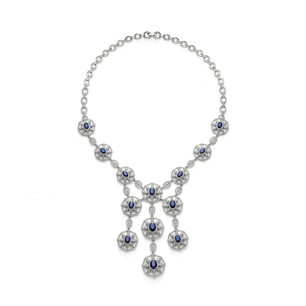 Necklace in 18kt white gold set with 13 oval cut sapphires 11.27 cts and 1446 diamonds 11.20 cts