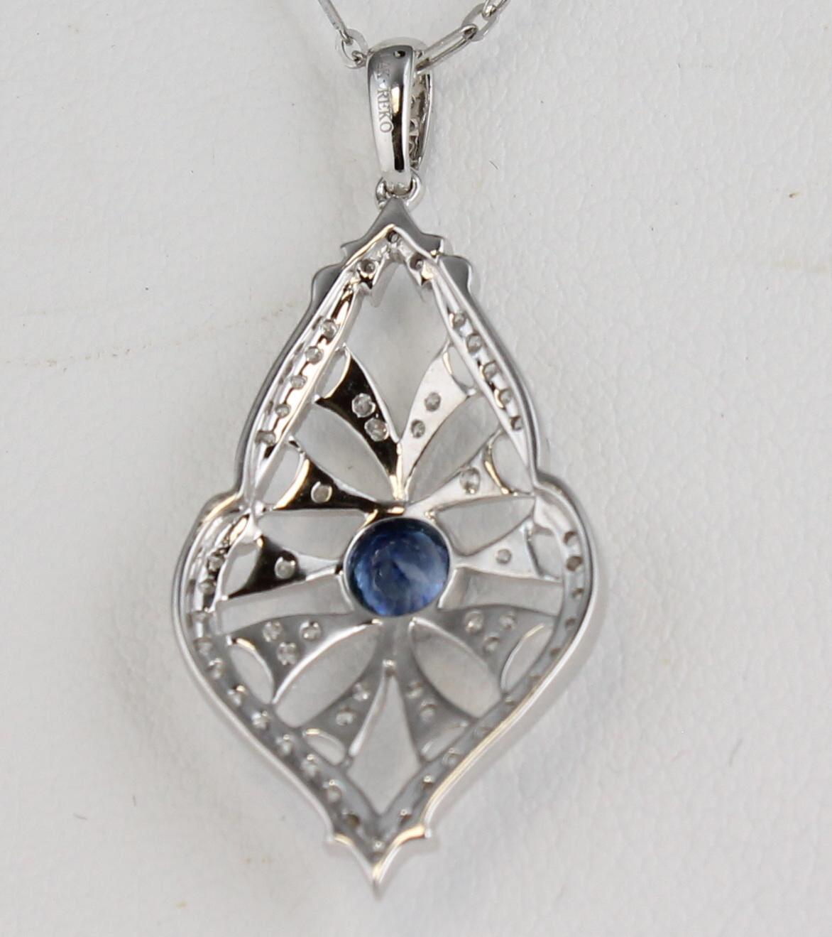 Lovely 14 karat white gold filagree showcases the beautiful .30 carat sapphire in the center.  There are .33 carat total weight in the filagree mounting and the bail that provide plenty of sparkle.  The pendant is .63 inch wide and 18 inches long