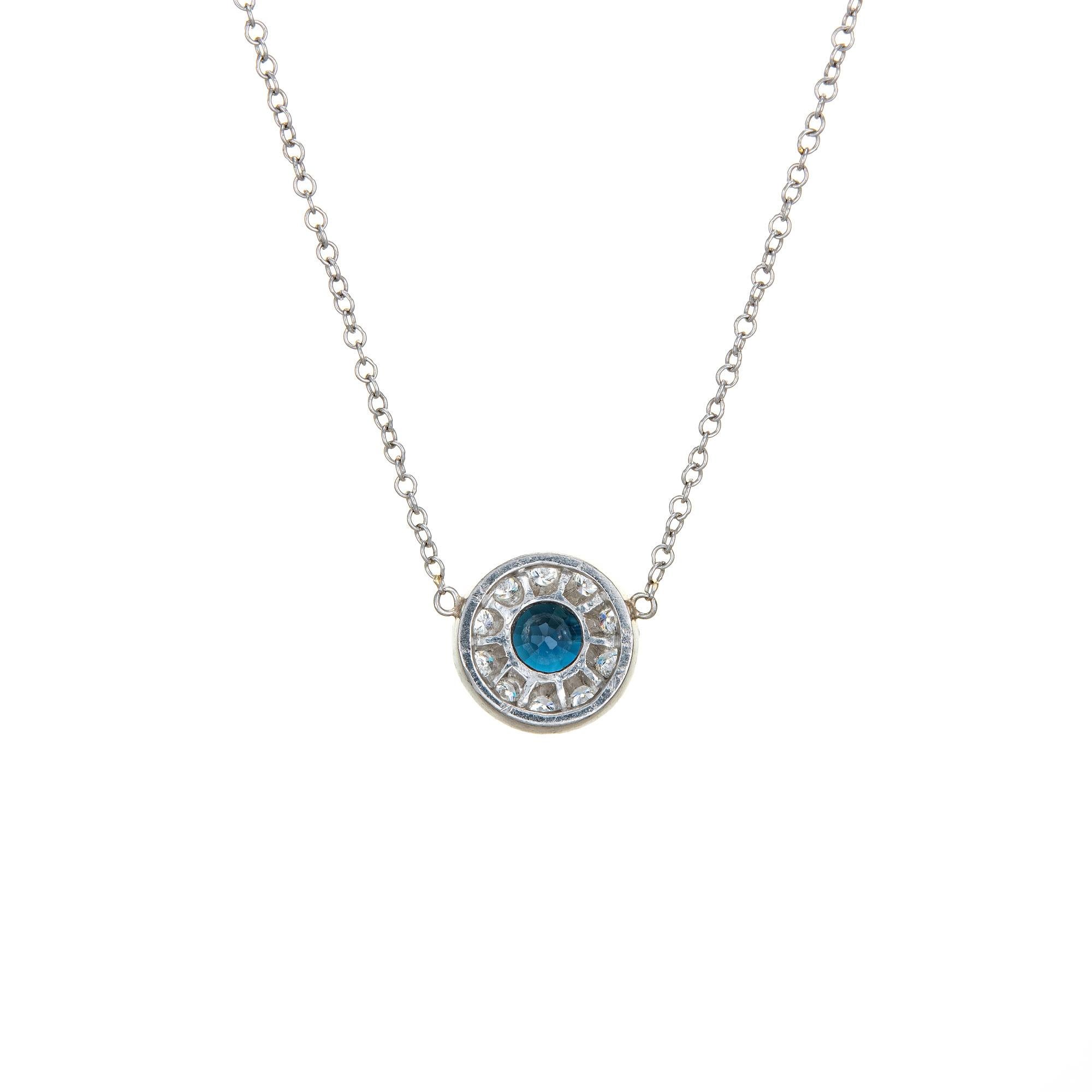 Stylish and finely detailed sapphire & diamond necklace crafted in platinum.  

Faceted round cut blue sapphire is estimated at 0.75 carats, accented with 10 estimated 0.03 carat round brilliant cut diamonds. The total diamond weight is estimated at