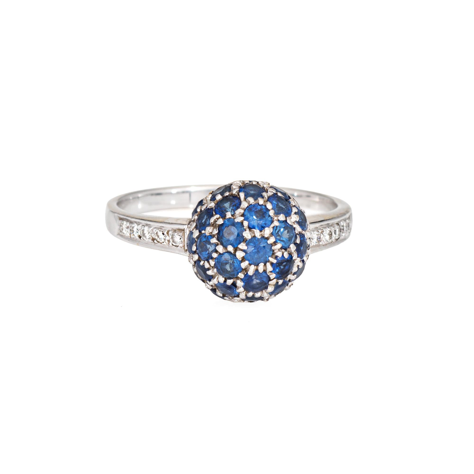 Stylish sapphire & diamond orb ring crafted in 18 karat white gold (circa 2000s). 

Sapphires measure from approx. 1.5mm to 2mm. Diamonds total an estimated 0.05 carats (estimated at H-I color and SI1-I1 clarity).  

Pave set sapphires are set into