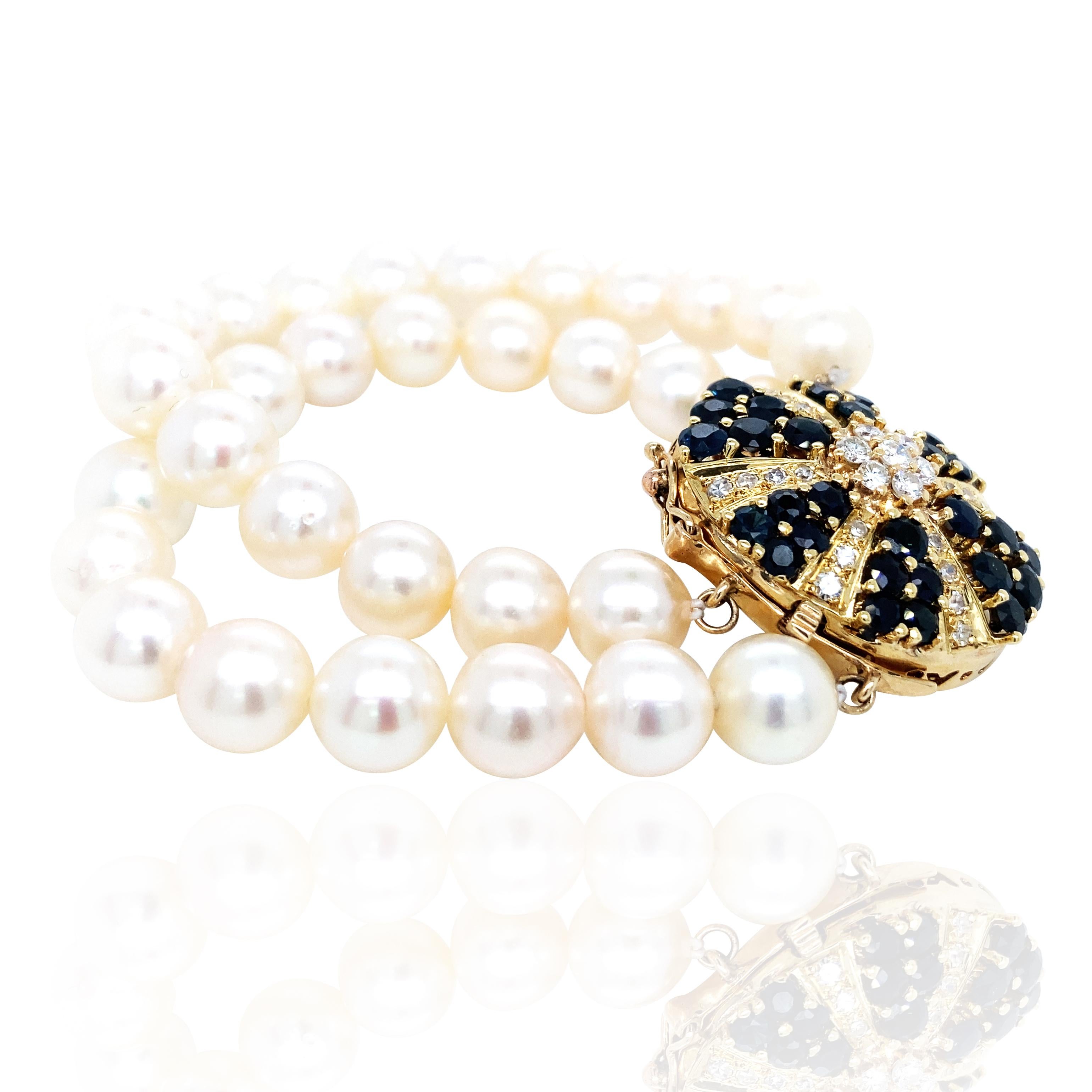 This elegant pearl bracelet features exquisite diamond and sapphire accents, showcasing a perfect combination of sophistication and luxury. The centerpiece is adorned with diamonds weighing approximately 0.72ct and sapphires totaling about 2.46ct,