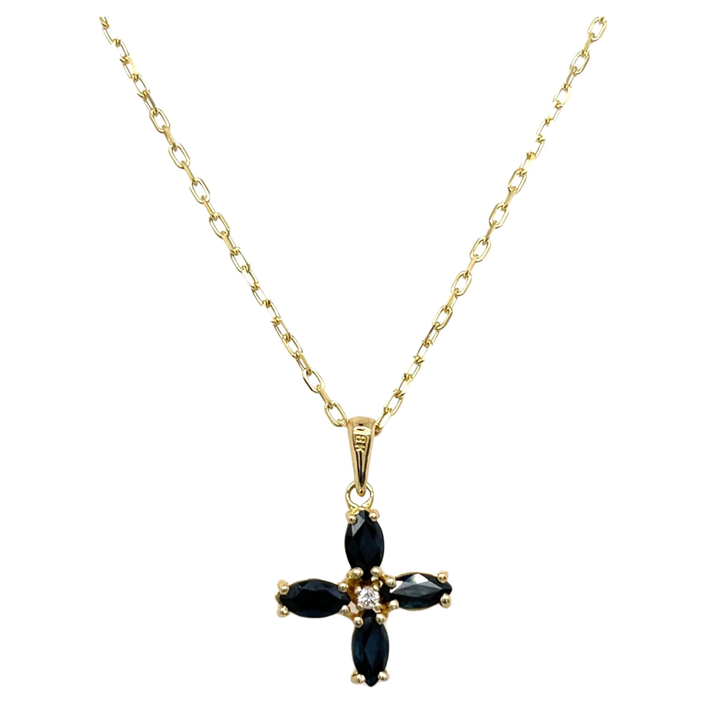 Pendentif en or jaune 18 carats serti de saphirs et de diamants, sur chaîne 9 carats