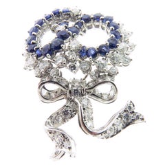 Blue Sapphire and Diamond Ribbons Bow Platinum Brooch