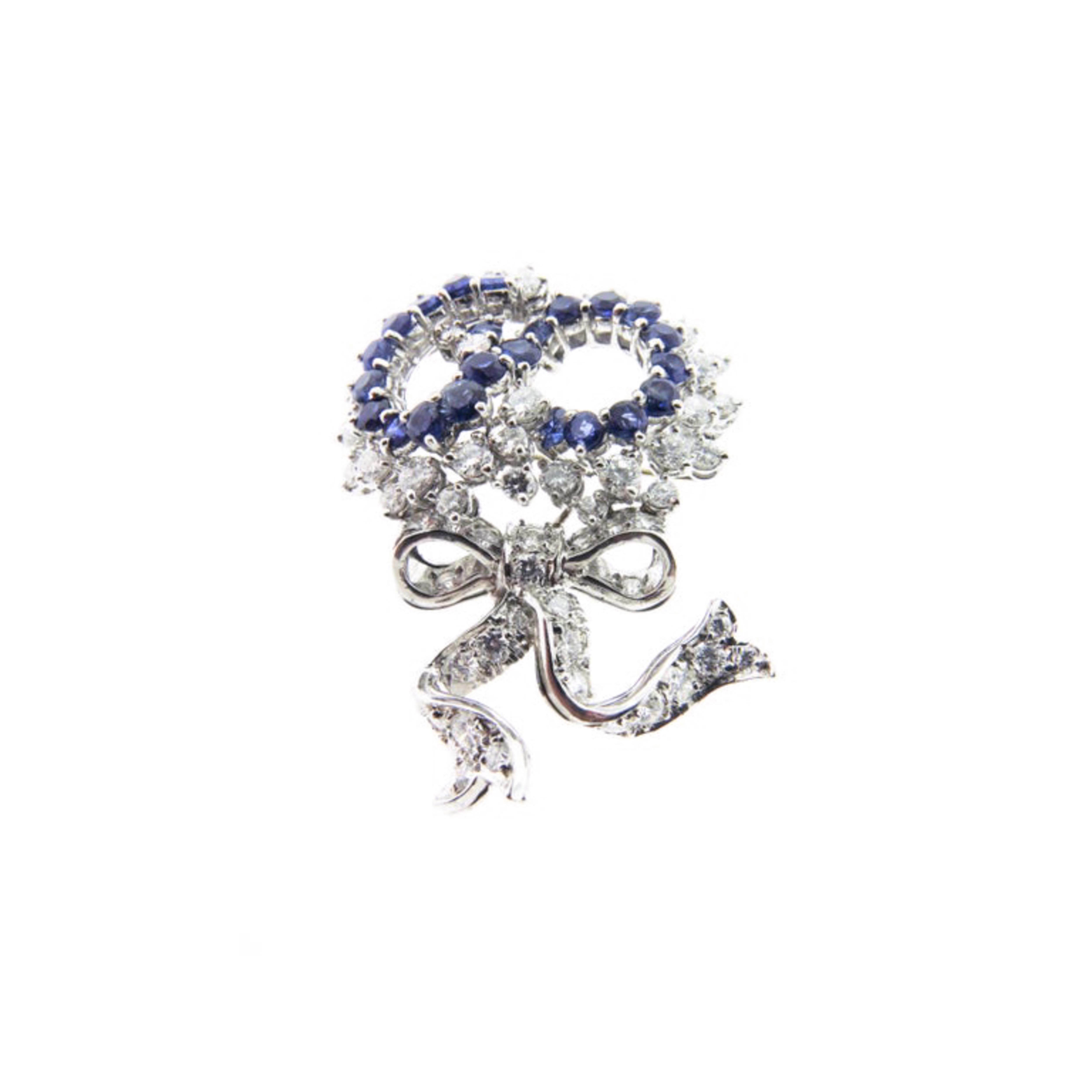Round Cut Blue Sapphire and Diamond Ribbons Bow Platinum Brooch For Sale
